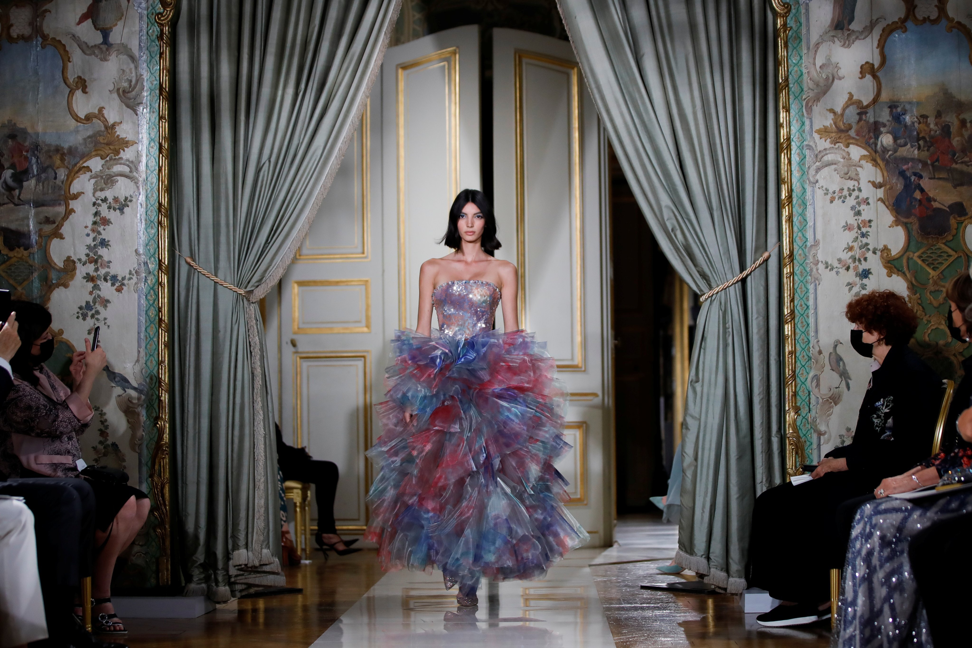 Models strolled the halls of the Italian Embassy in Paris at Giorgio Armani Privé’s autumn/winter 2021/22 haute couture show at Paris Fashion Week 2021. Photo: Reuters