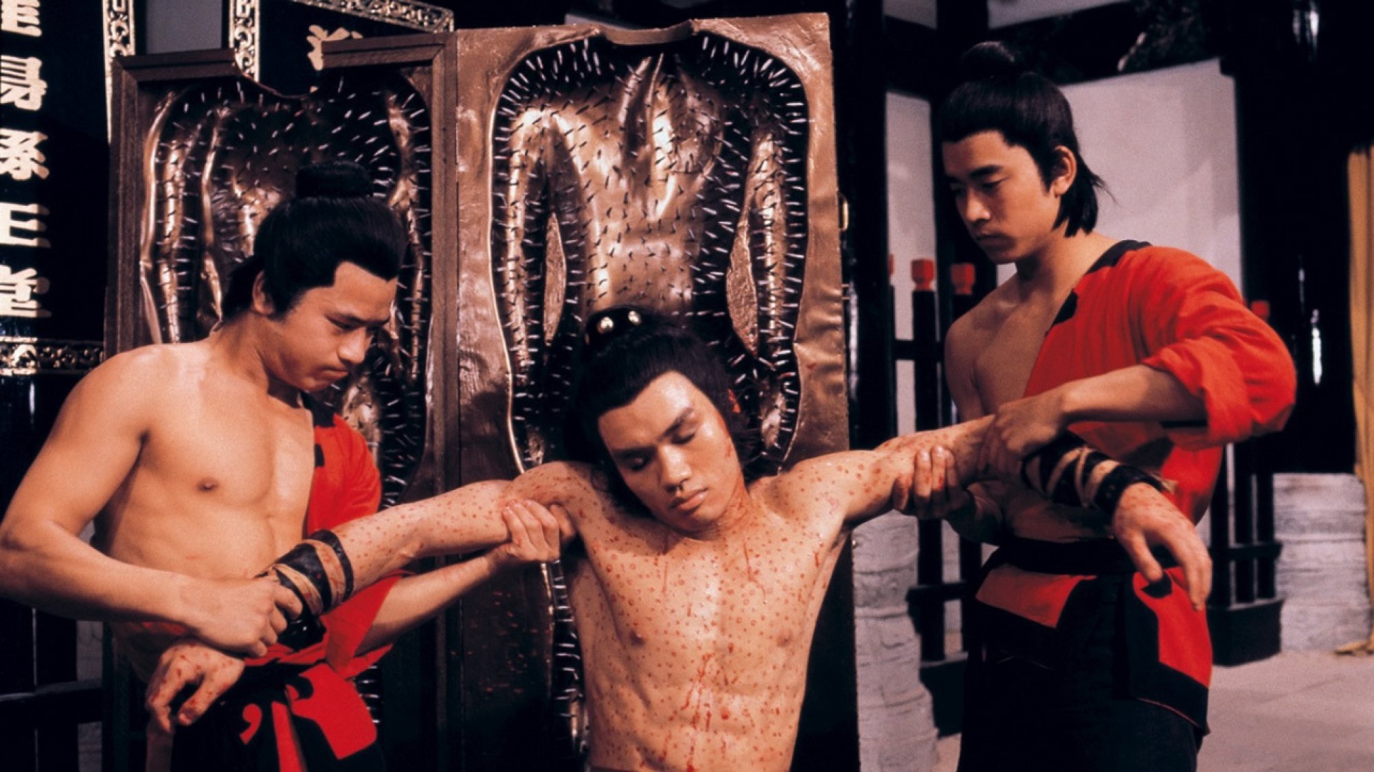 Lo Mang (centre) in a still from The Five Venoms (1978).