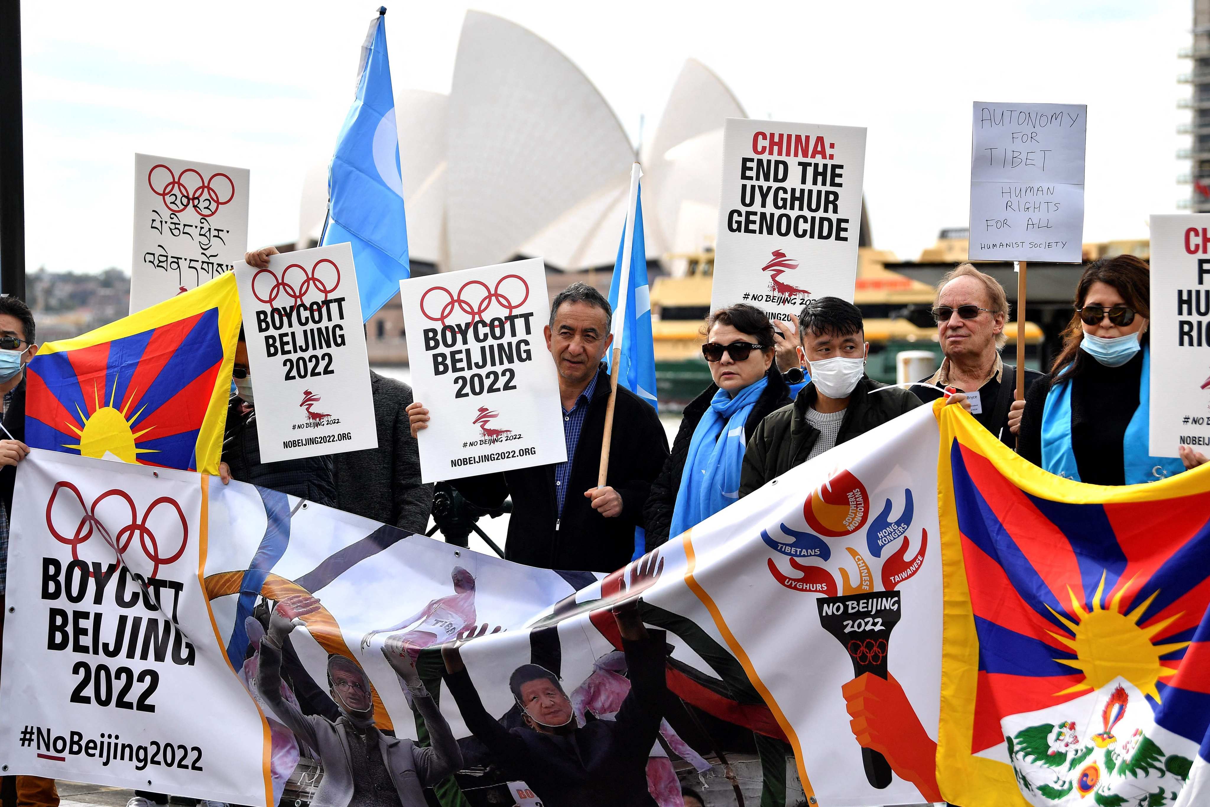 Protesters at a demonstration in Sydney on June 23 call on the Australian government to boycott the 2022 Beijing Winter Olympics over China’s human rights record. Photo: AFP