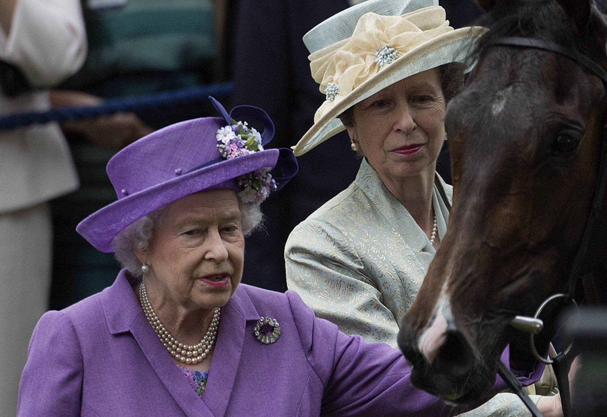 Britain’s Queen Elizabeth with her daughter Princess Anne in June 2013. Photo: AP Photo