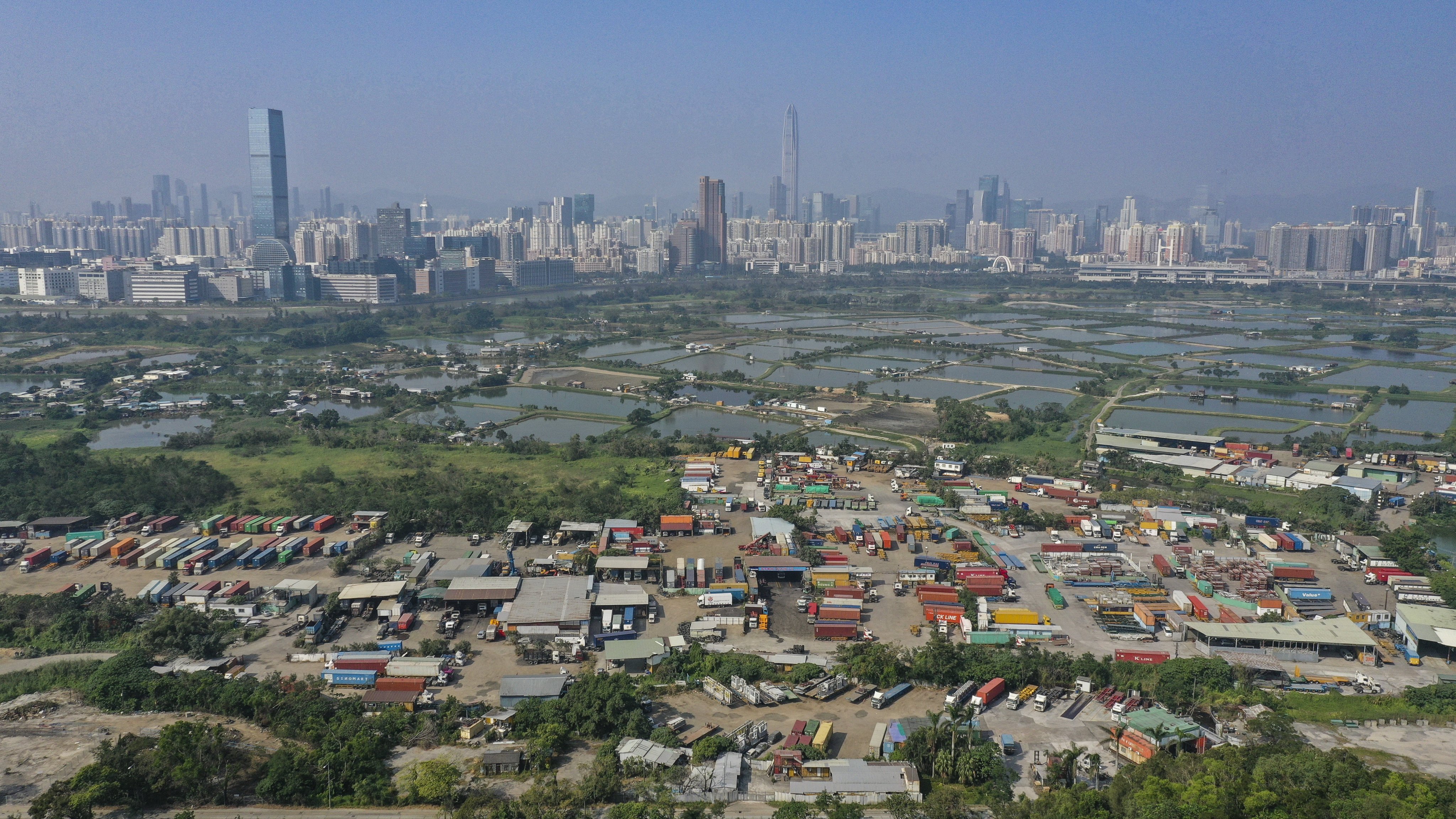 A view of rural land in northern Hong Kong, with Shenzhen in the background. Photo: Roy Issa