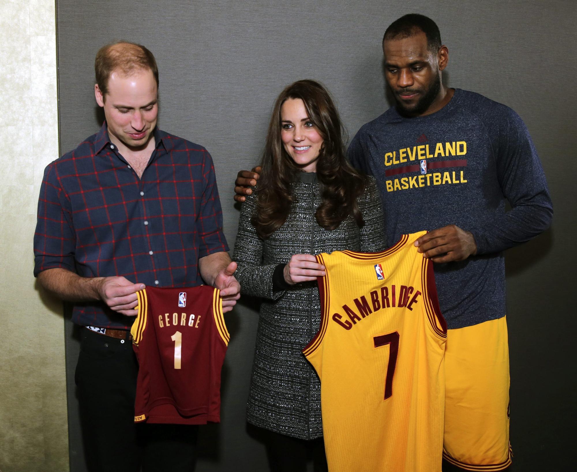 Prince William and Kate Middleton pose with LeBron James backstage at the Cleveland Cavaliers vs Brooklyn Nets game in December 2014. Photo: EPA