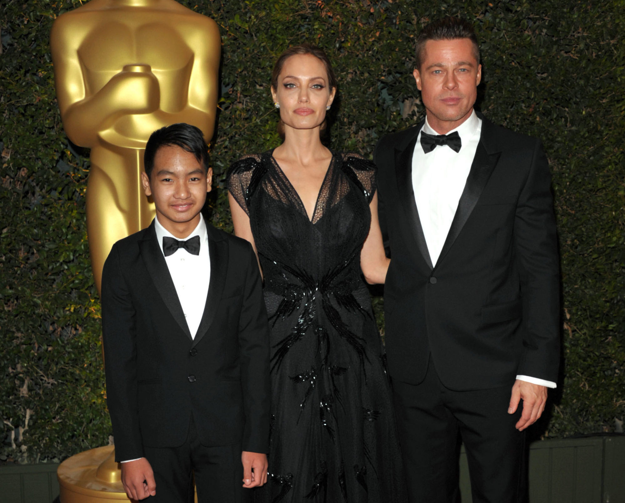 Maddox Jolie-Pitt, Angelina Jolie and Brad Pitt attend the 2013 Governors Awards in Los Angeles in November 2013. Photo: Invision/AP