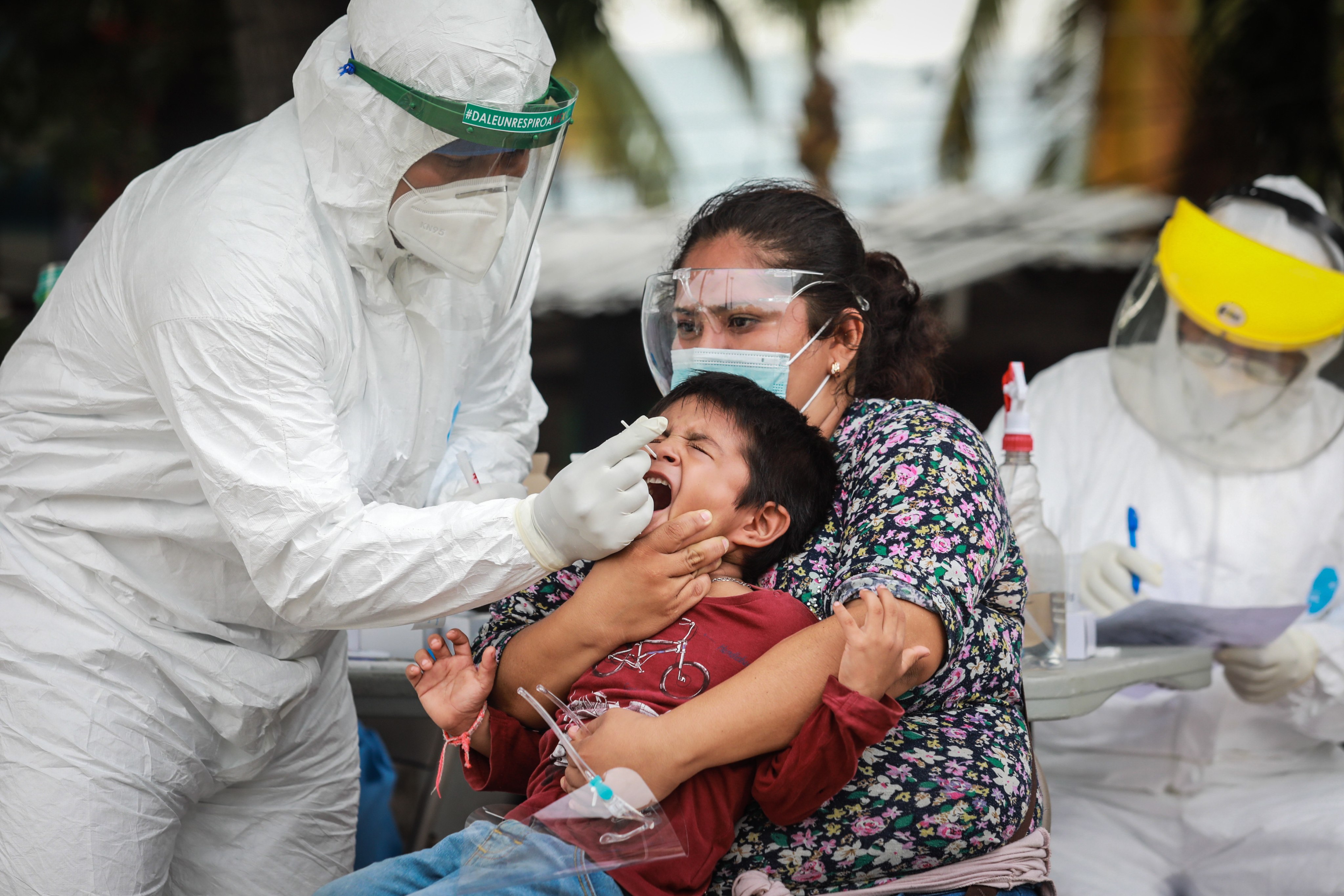 A health worker performs a Covid-19 test on a minor, in Acapulco, Mexico, on July 29.  The WHO is calling for at least 10 per cent of the population of every country to be vaccinated by September. Photo: EPA-EFE