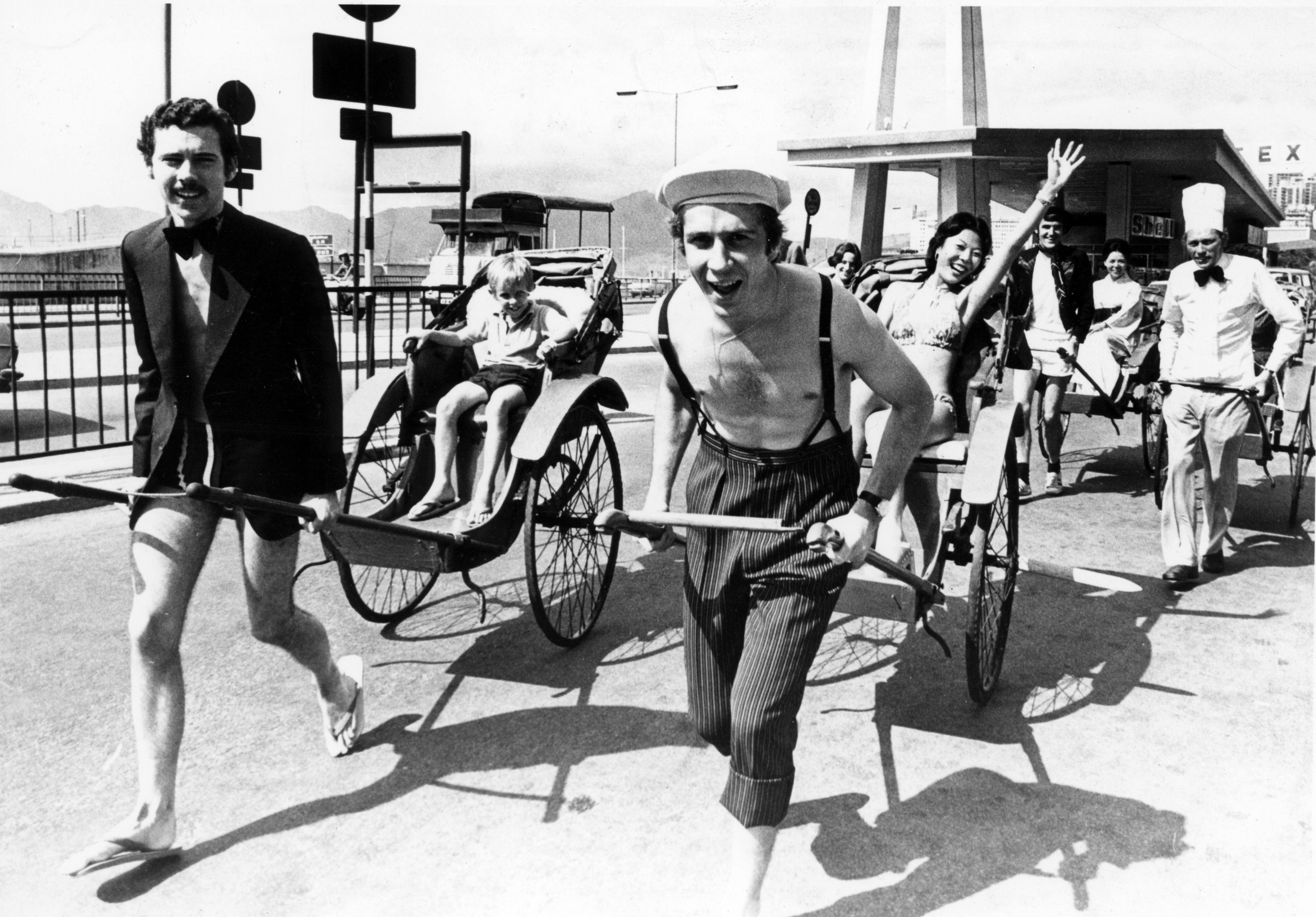 The Excelsior Hotel team warms up before taking part in the rickshaw derby at Victoria Park in Causeway Bay in August, 1975. Photo: Courtesy of Excelsior Hotel