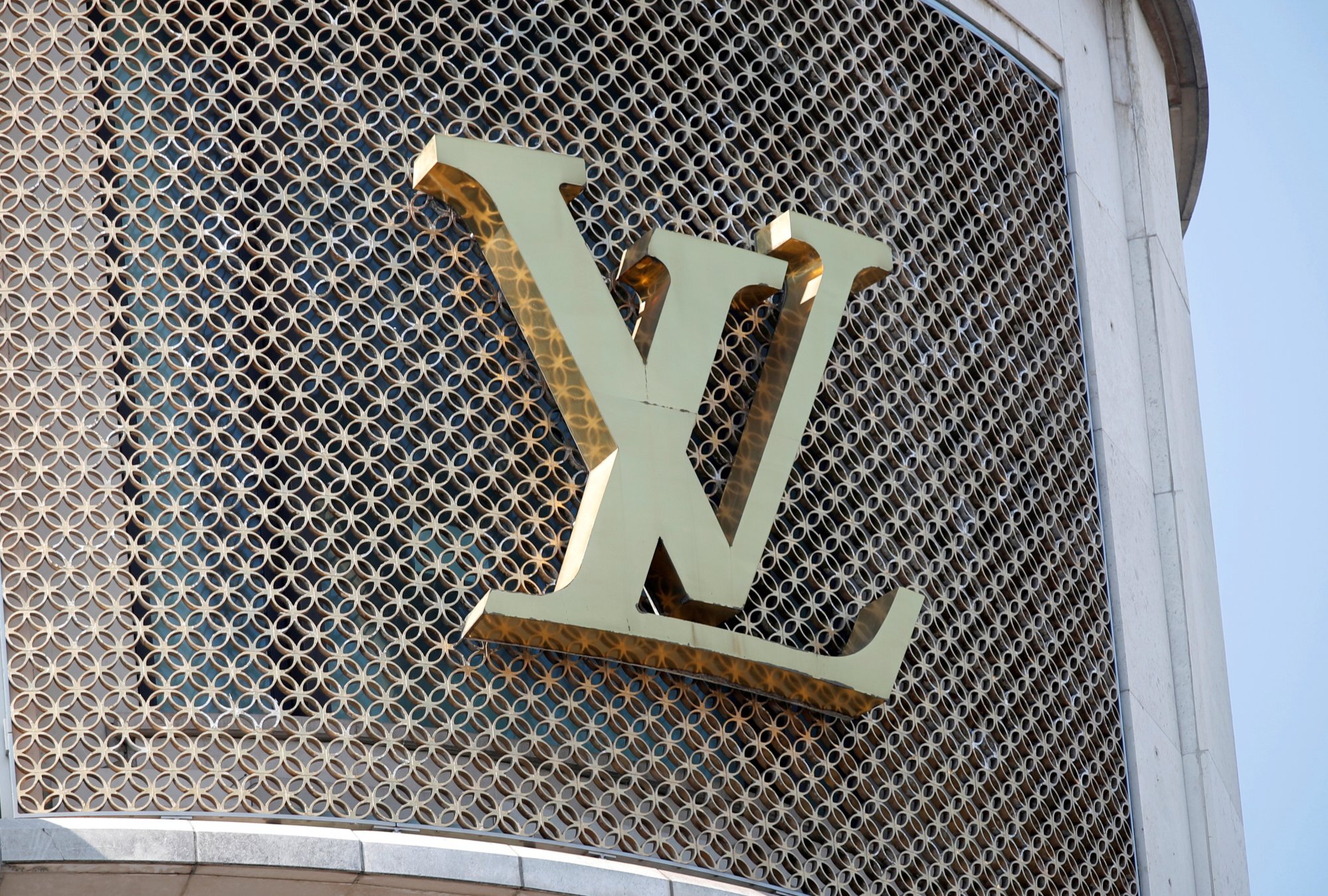 A Louis Vuitton logo is seen outside a store on the Champs-Elysees in Paris, France, in September 2020. Photo: Reuters