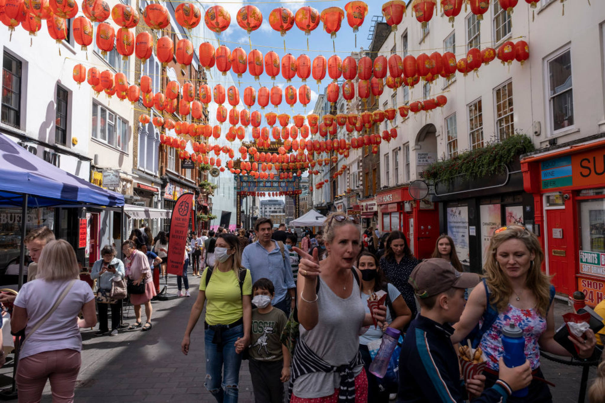 Chinatown in London. Few people are wearing face masks in Britain now. Photo: Getty Images