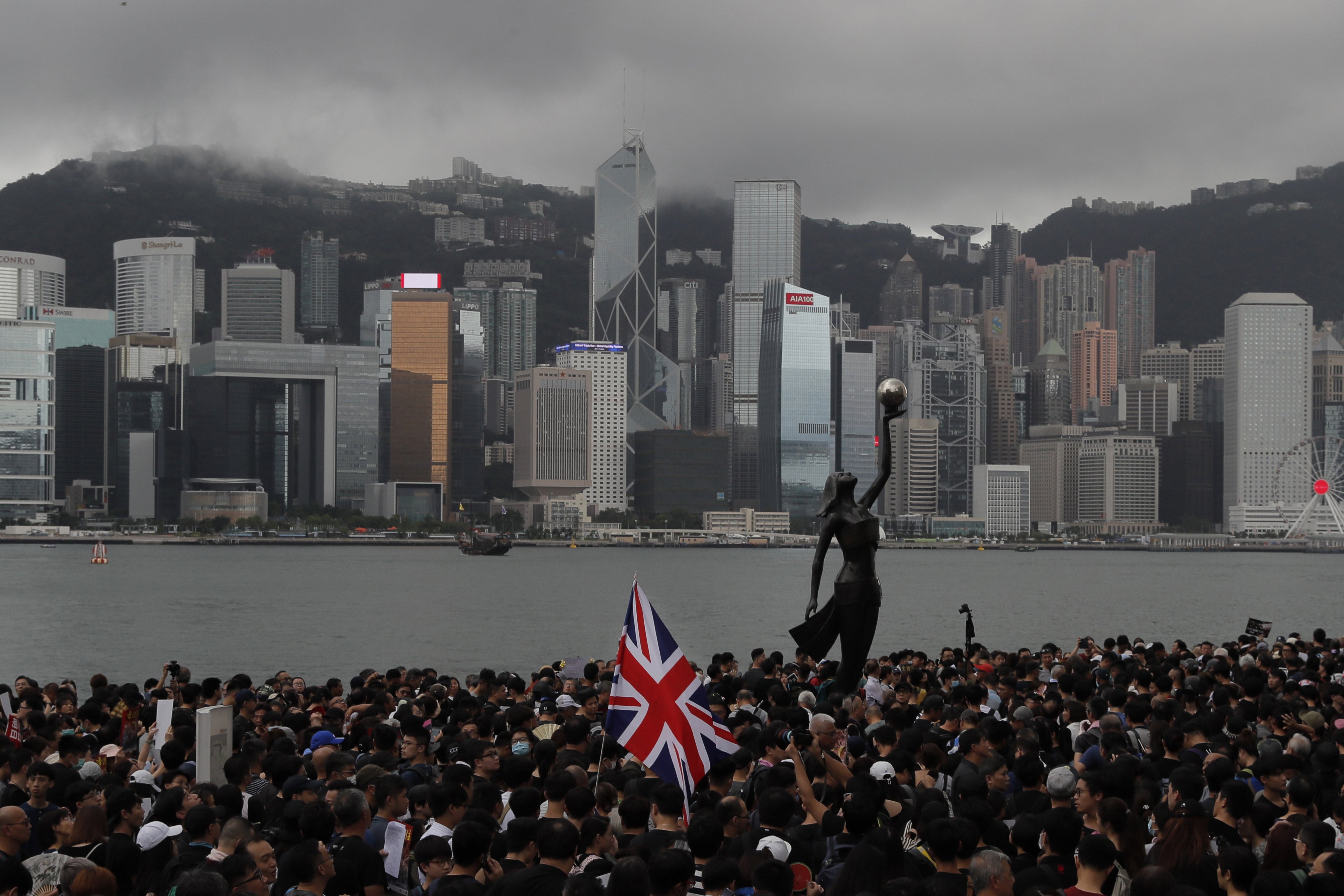 Demonstrators fly the British flag during the Hong Kong protests in 2019. Photo: AP