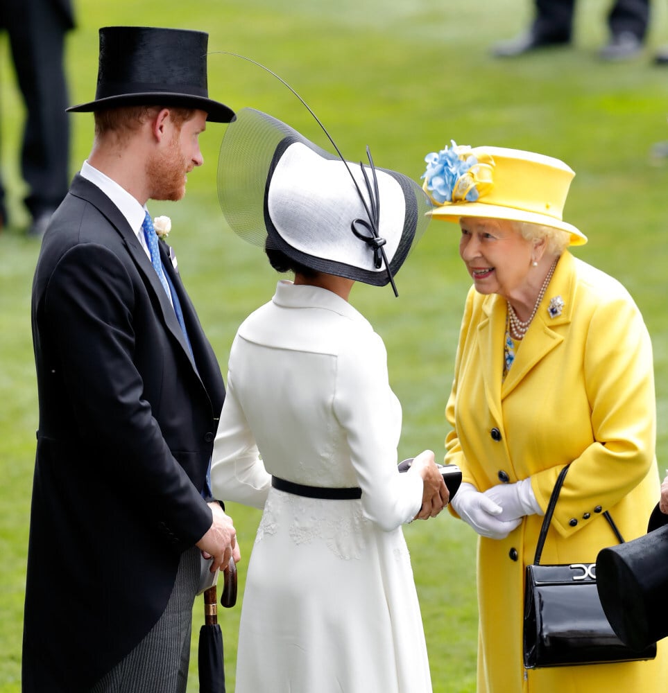 Queen Elizabeth with the couple at Royal Ascot in 2018 before they officially left the royal family and were relieved of their official duties. Photo: Getty Images