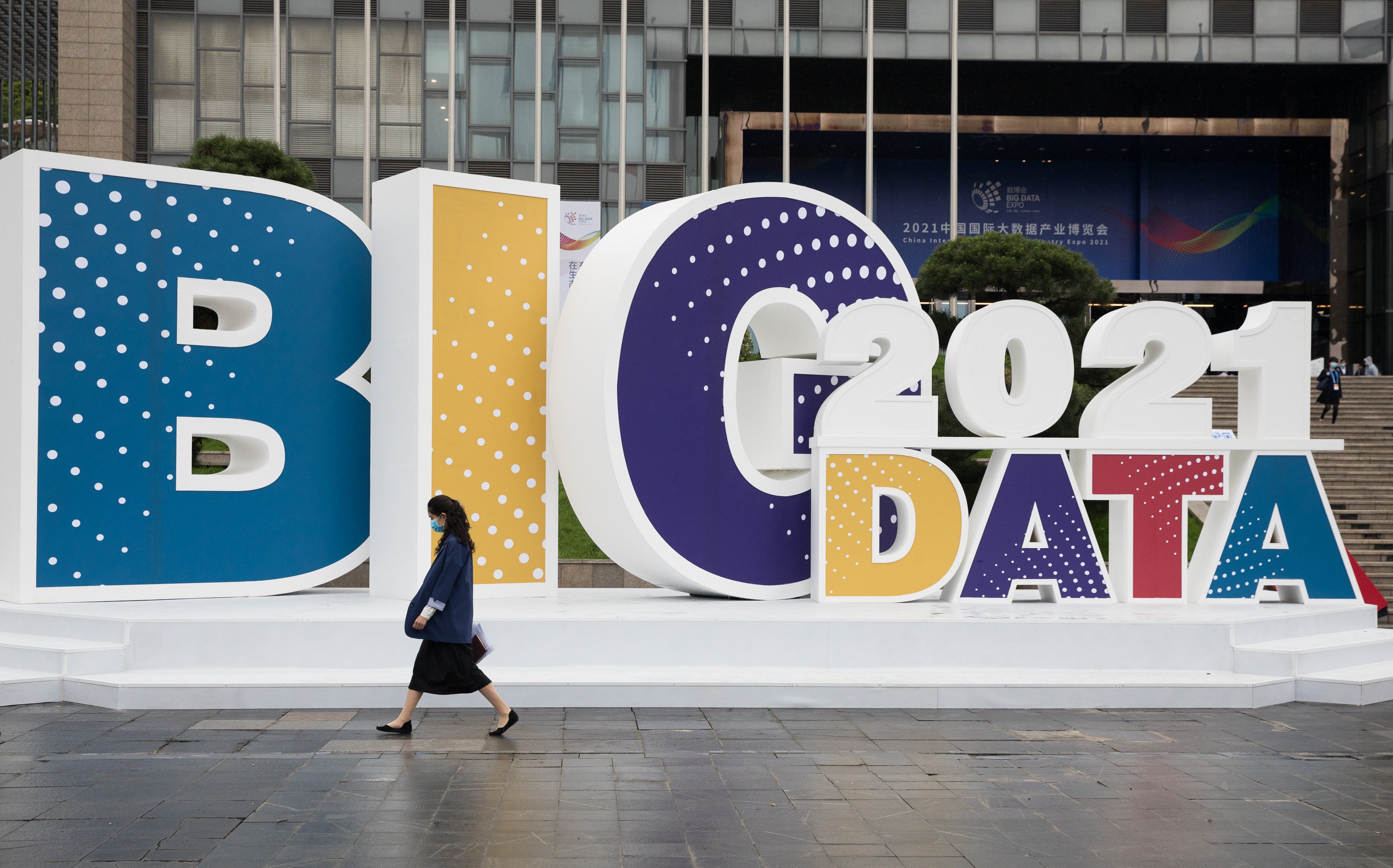 A visitor walks past an outdoor installation at the China International Big Data Industry Expo 2021 in Guiyang, Guizhou province, on May 26. Photo: Xinhua