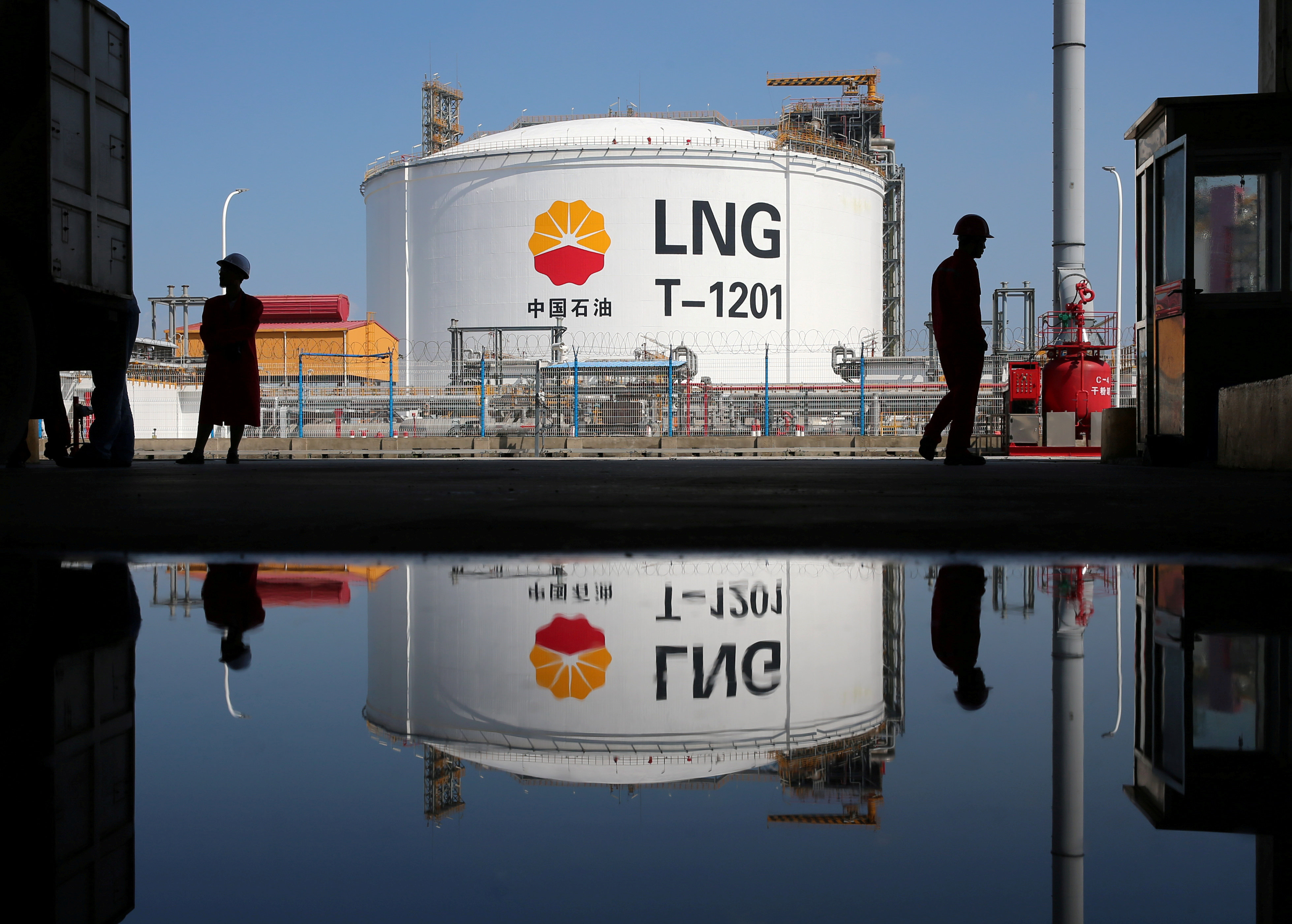 A liquified natural gas (LNG) storage tank and workers are reflected in water at PetroChina’s receiving terminal at Rudong port in Nantong, Jiangsu province, China, in September, 2018. Photo: Reuters