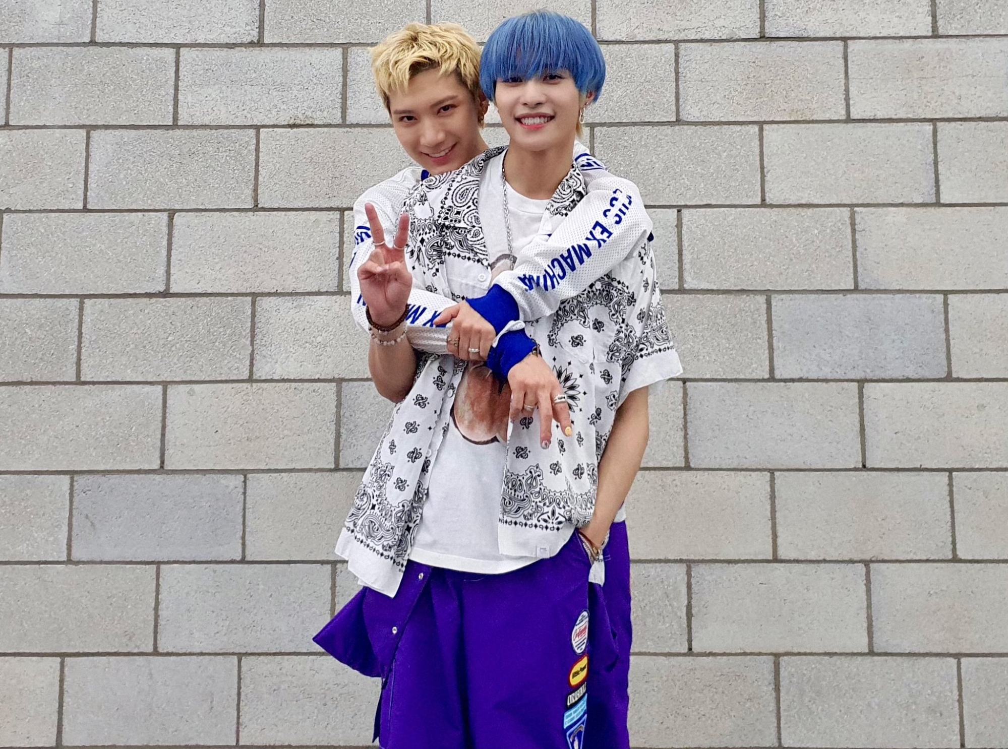 Ten (left) and YangYang remain upbeat on the future of WayV. Photo: WayV Twitter/WayV_official