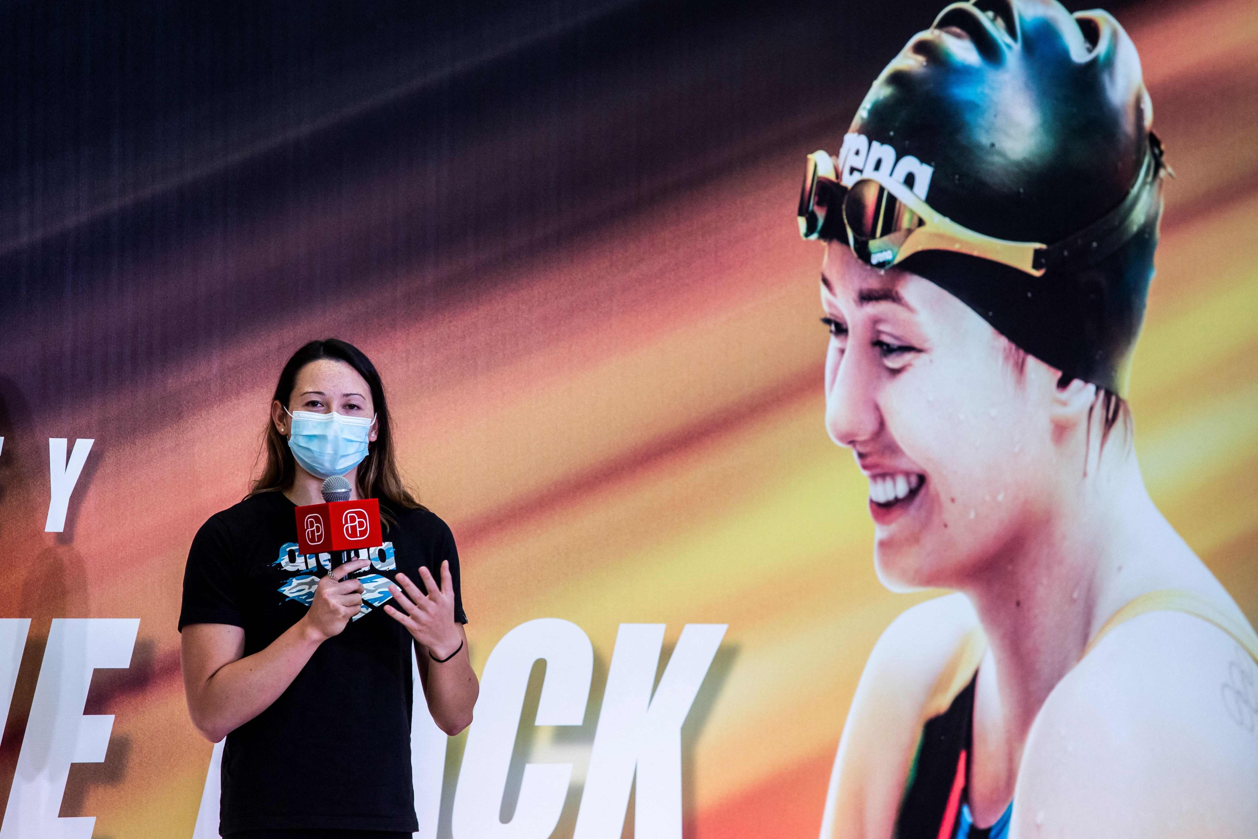 Hong Kong’s Olympic silver-medallist Siobhan Haughey speaks at an event in a mall in Hong Kong on August 20. Haughey has spoken of how she wanted to quit swimming when she was in Primary Six but her mother urged her on. Photo: AFP