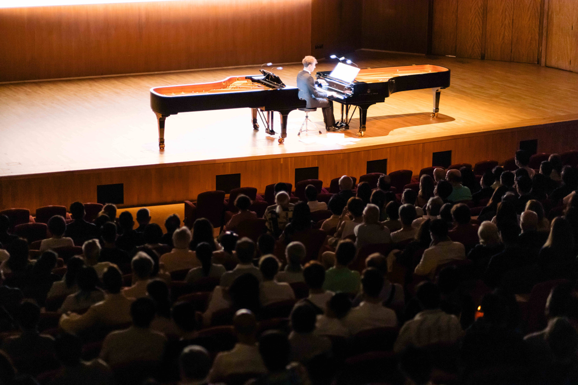 David Greilsammer swivels theatrically from one piano to another to perform the alternating Scarlatti and Cage sonatas. Photo: Kenny Cheung/Premiere Performances of Hong Kong