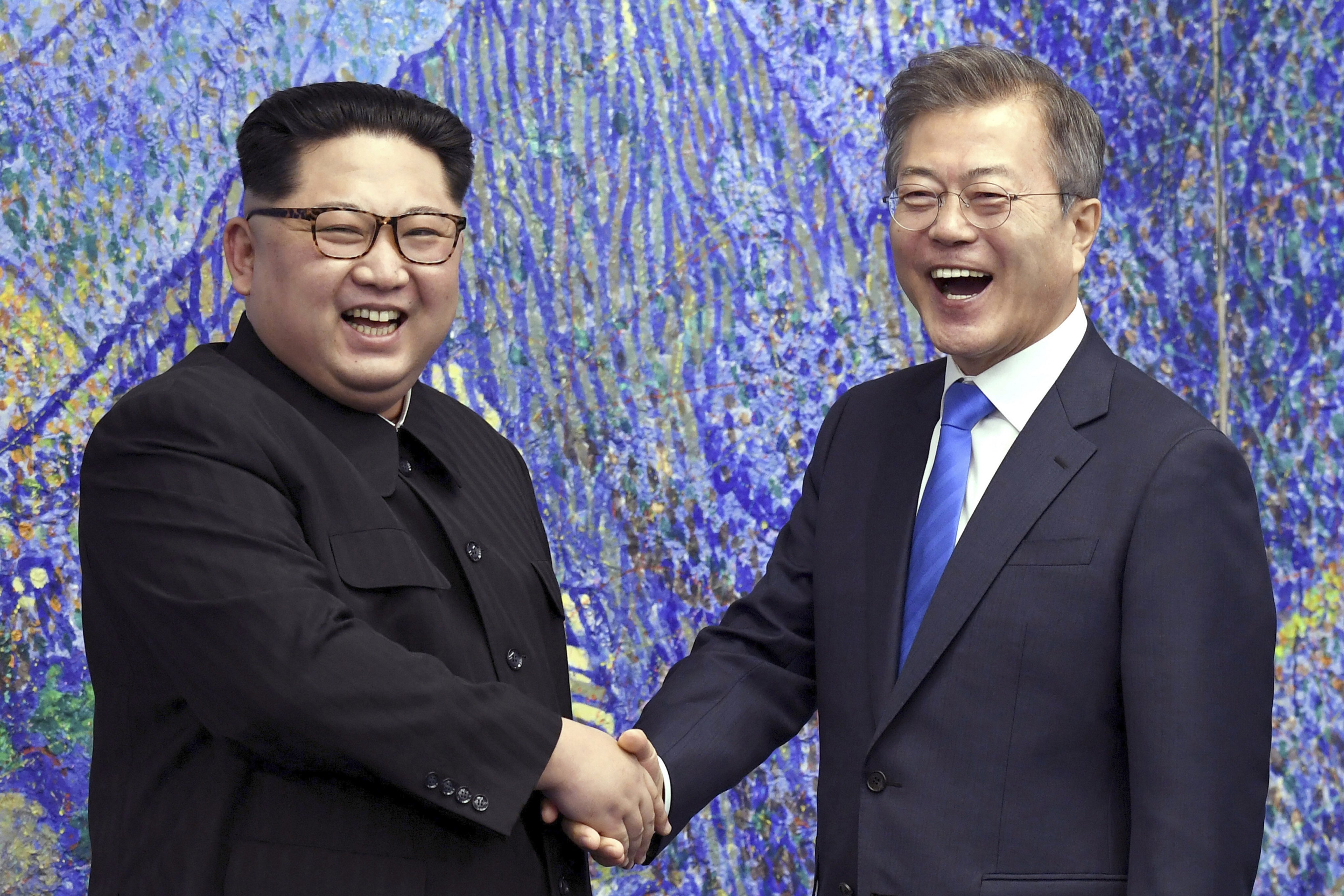 North Korean leader Kim Jong-un (left) and South Korean President Moon Jae-in enjoy a light moment in the Peace House at the border village of Panmunjom in the Demilitarized Zone on April 27, 2018. Moon appears anxious to leave a legacy of North-South amity when he steps down next year. Photo: AP