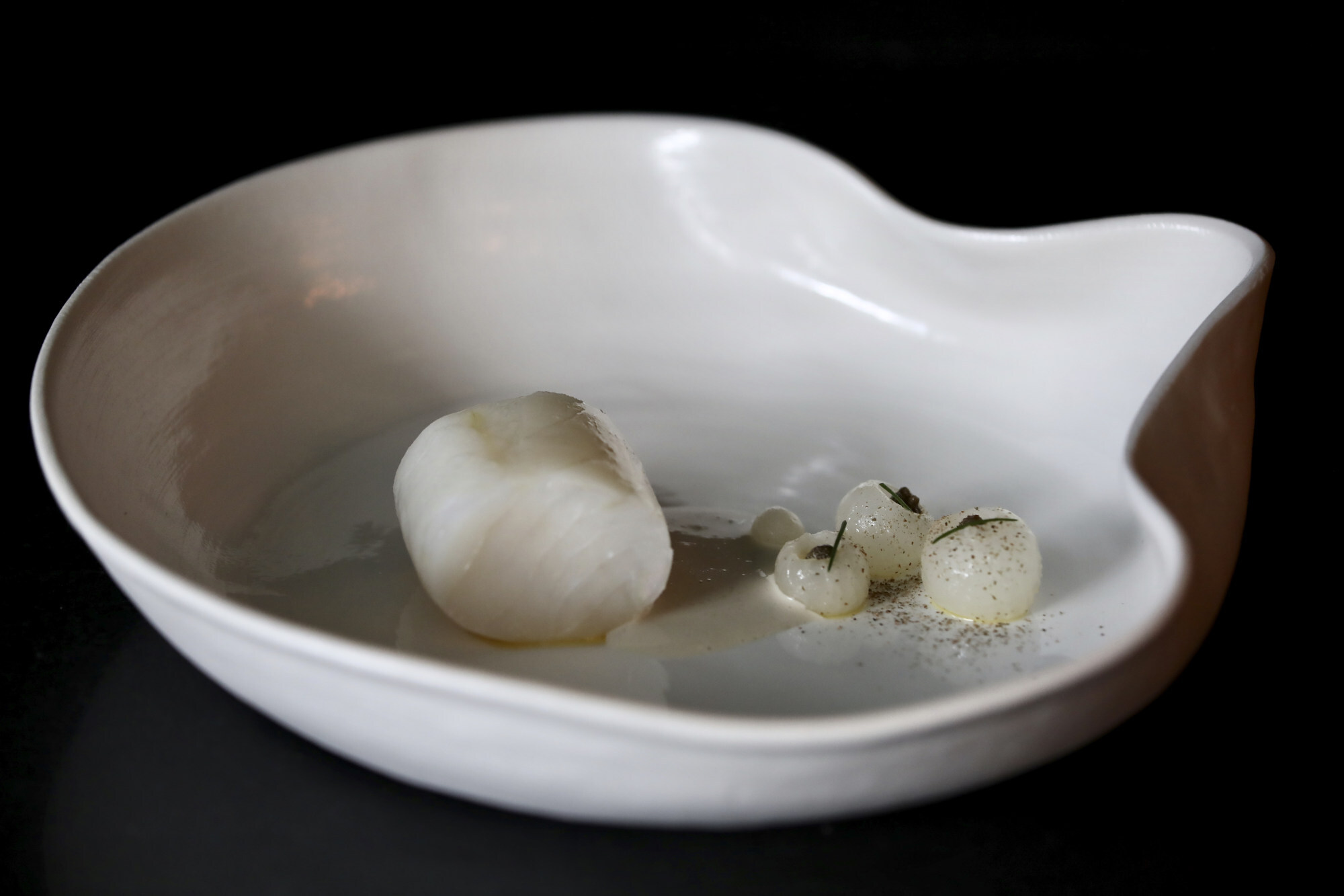 Confit salted cod, almond, capers and turnip. Photo: Jonathan Wong