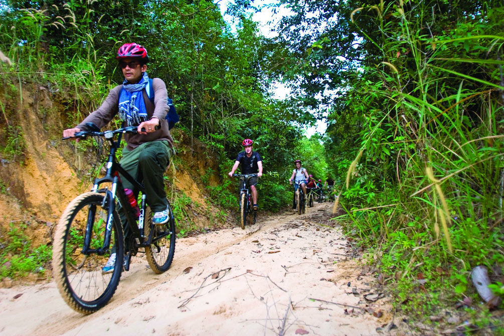 Mountain bikers in Chi Phat, Cambodia. 