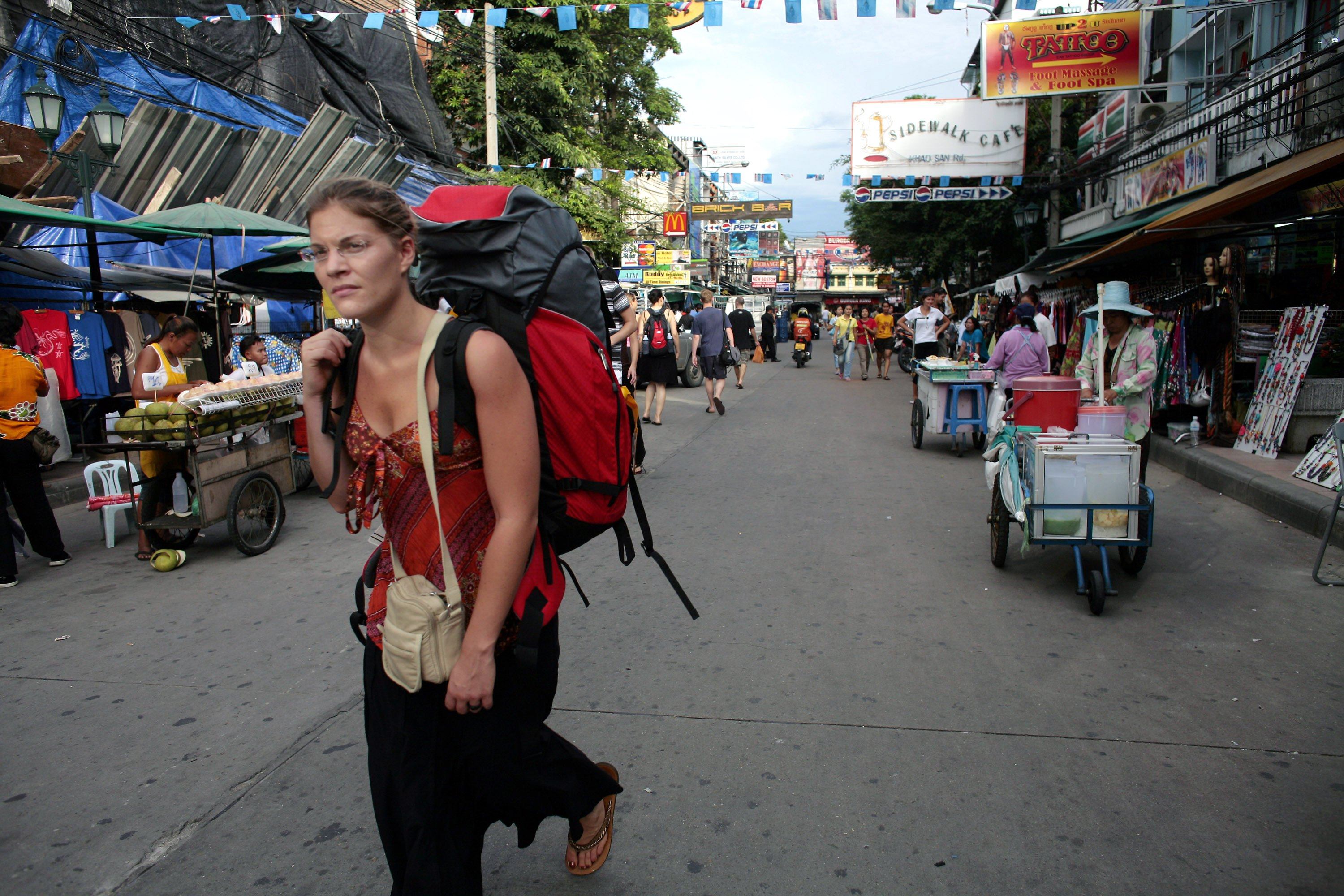 A backpacker on Bangkok’s Khaosan Road. Photo: Getty Images