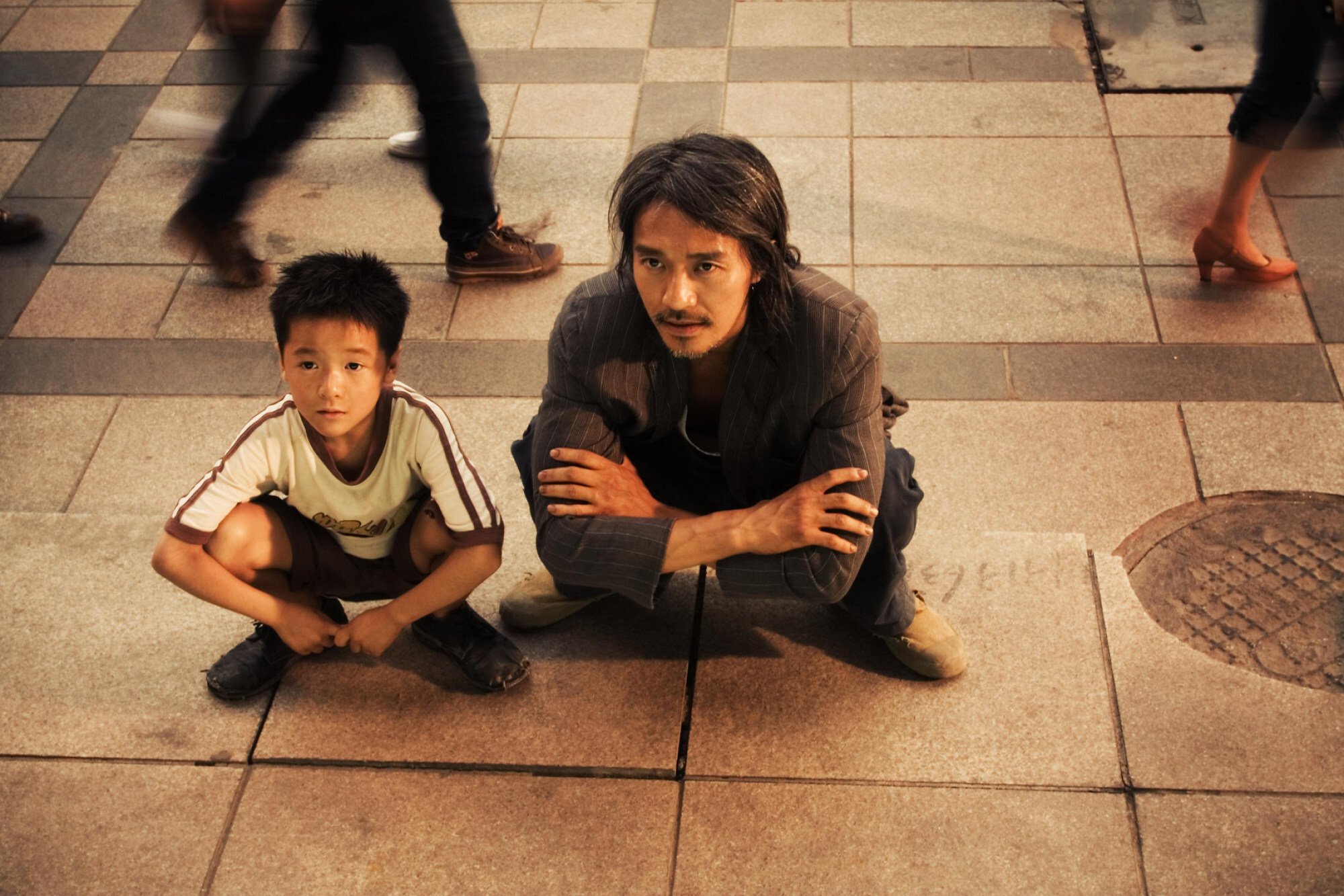 Stephen Chow with co-star Xu Jiao in movie CJ7. Photo: Star Overseas