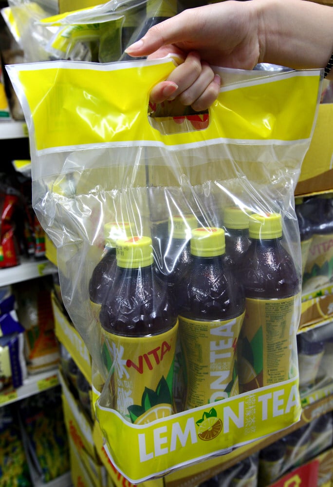 Six bottles of lemon tea inside a plastic bag at Wellcome. Photo: SCMP