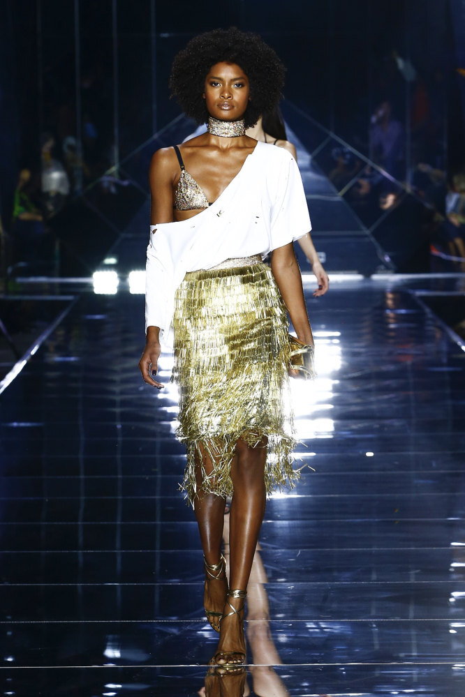 Dolce & Gabbana’s spring/summer 2022 women’s collection at Milan Fashion Week on September 25 featured fringed gold and silver dresses. Photo: Handout
