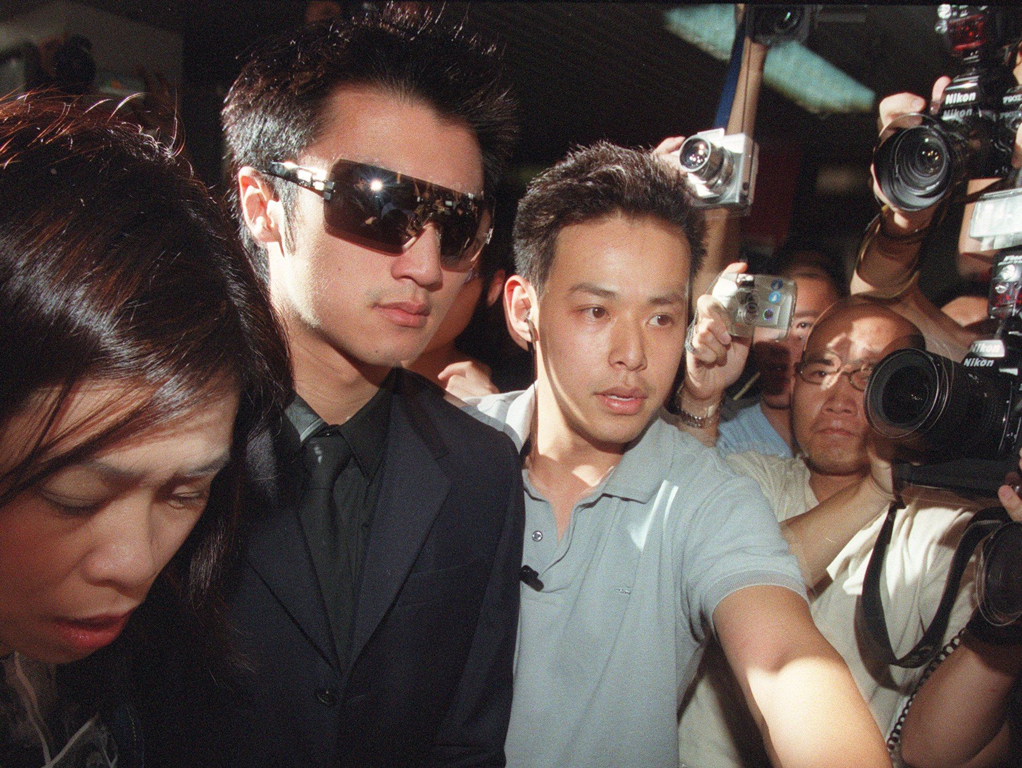 Canto-pop star Nicholas Tse arrives at the Independent Commission Against Corruption headquarters in Central in June 2002, where he was charged with conspiracy to pervert the course of justice. Photo: SCMP 