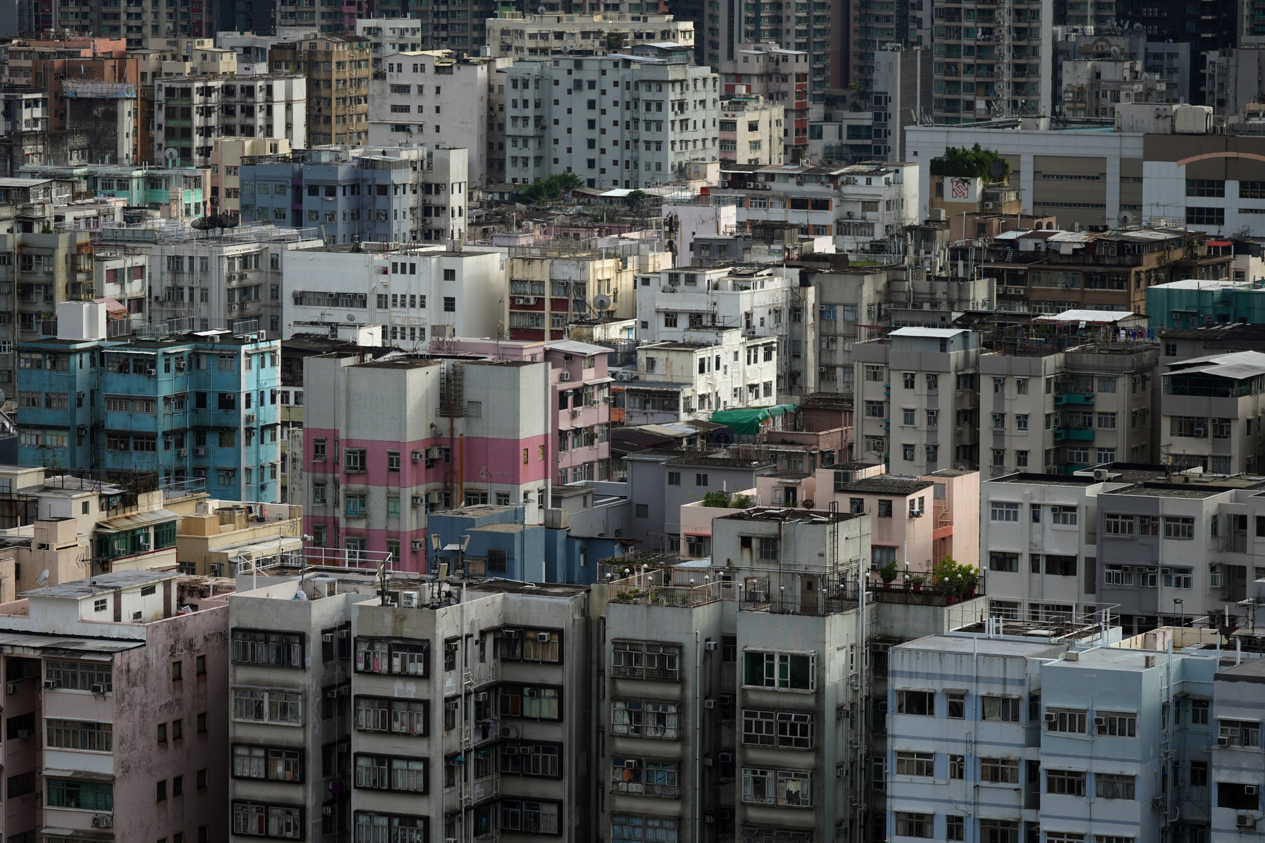 Old building are clustered together in West Kowloon in September 2020. Rising housing prices have pushed many Hongkongers into apartments subdivided into cramped living spaces. Photo: Sam Tsang