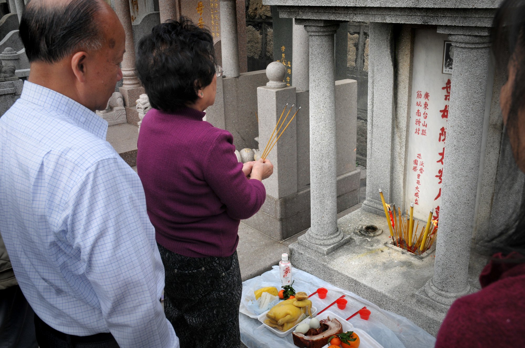 People may visit the graves of their ancestors to ask for blessings during the festival.