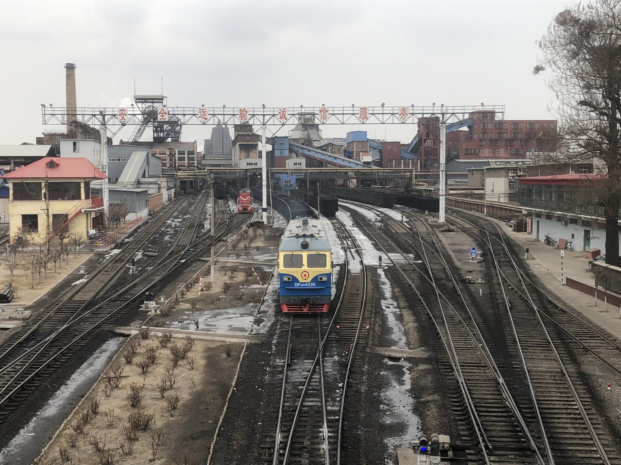 A freight train rolls out of the mine and museum complex in Tangshan. Photo: Thomas Bird