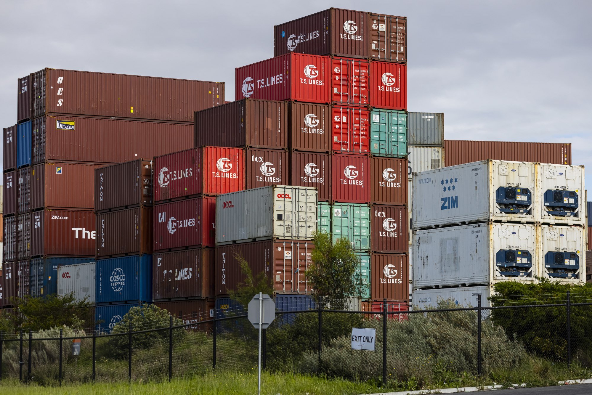 Shipping containers sit piled up at Victoria International Container Terminal in Melbourne, Australia, on October 4. Global trade is expected to rebound by 10.8 per cent this year. Photo: EPA-EFE