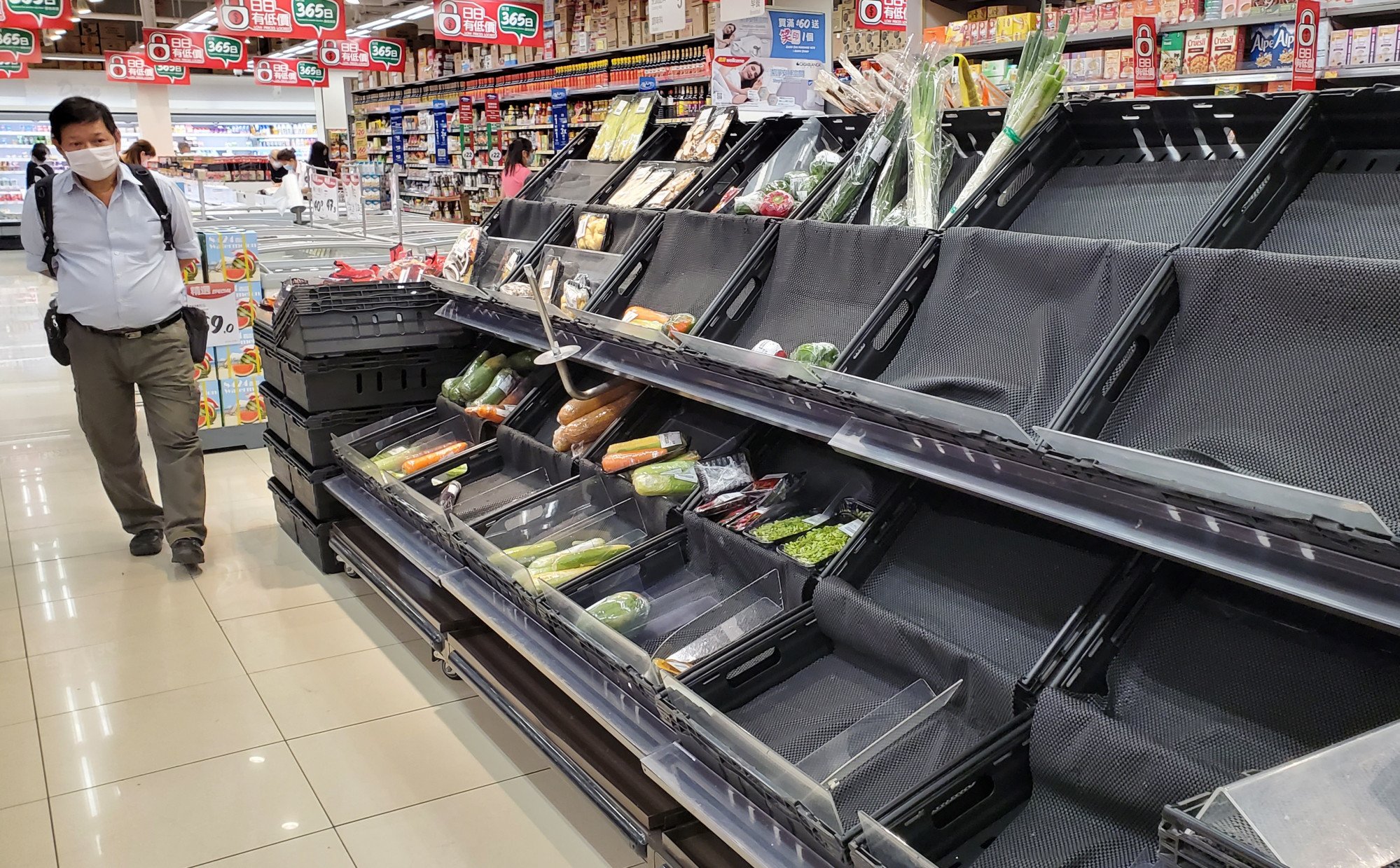 A Wellcome supermarket’s fresh produce section after customers in Hang Hau, Hong Kong had stocked up on food supplies as Tropical Storm Kompasu neared. Photo: Edmond So