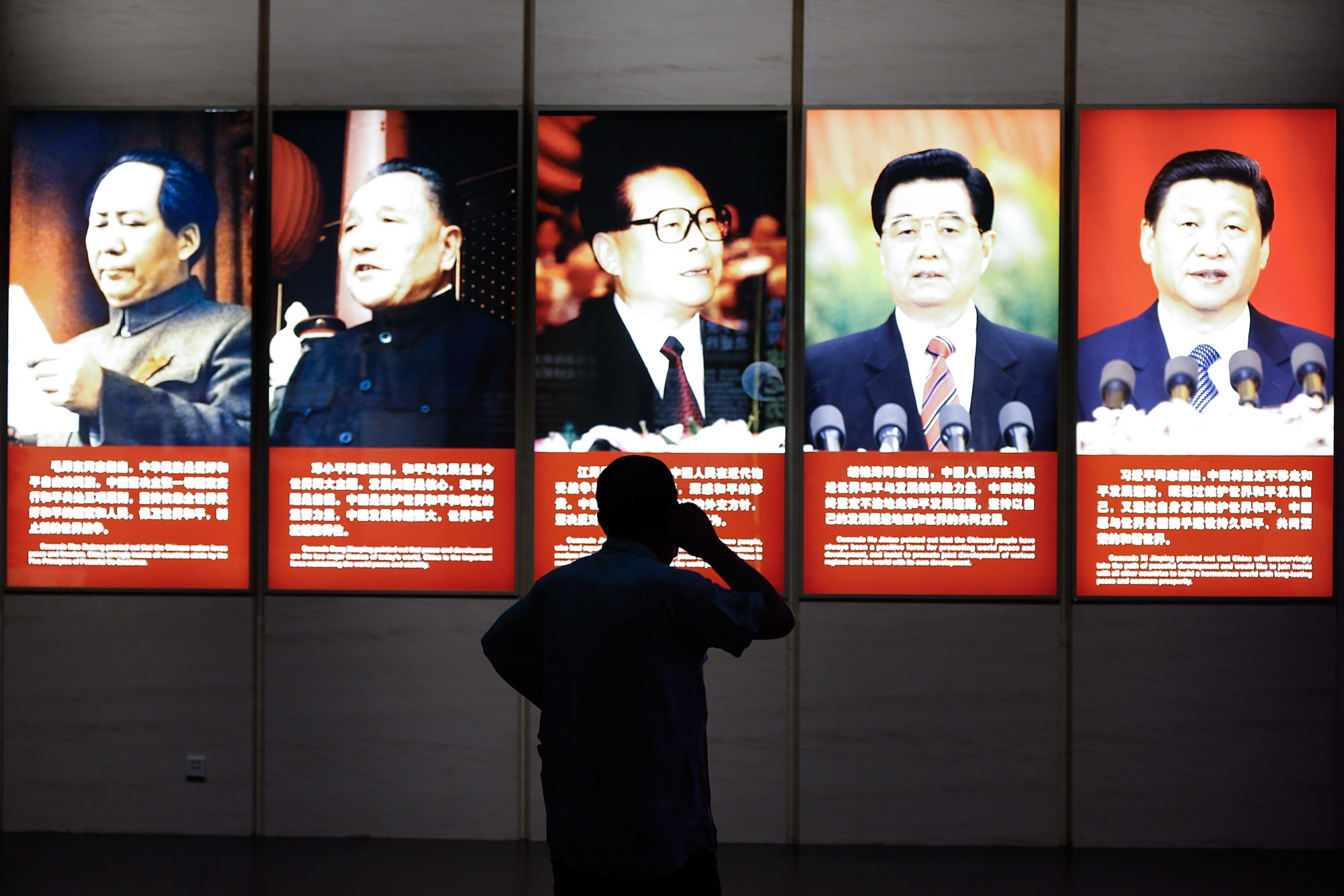 An exhibition in Beijing shows portraits of former Chinese leaders: (L-R) Mao Zedong, Deng Xiaoping, Jiang Zemin, Hu Jintao and current President Xi Jinping. Photo: Getty Images