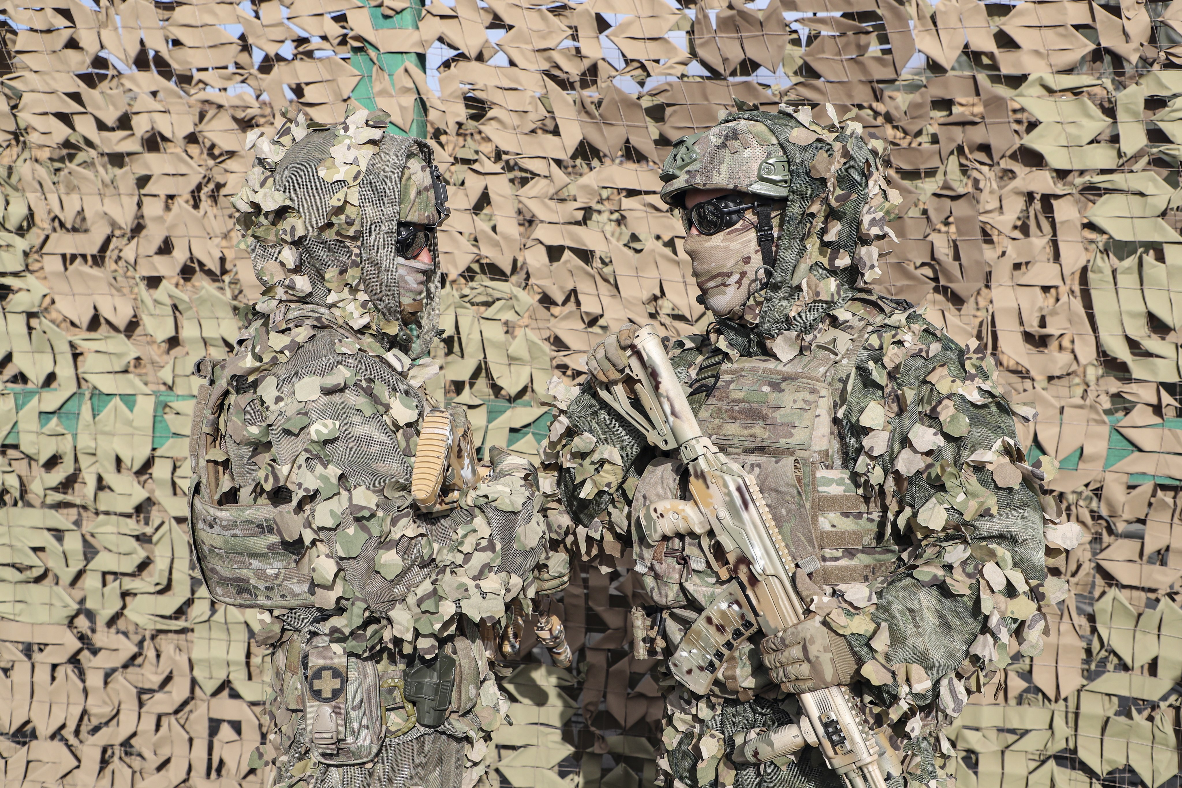 Camouflaged Russian soldiers take part in a joint anti-terrorist exercise with the armed forces of the Shanghai Cooperation Organization member states. Photo: EPA
