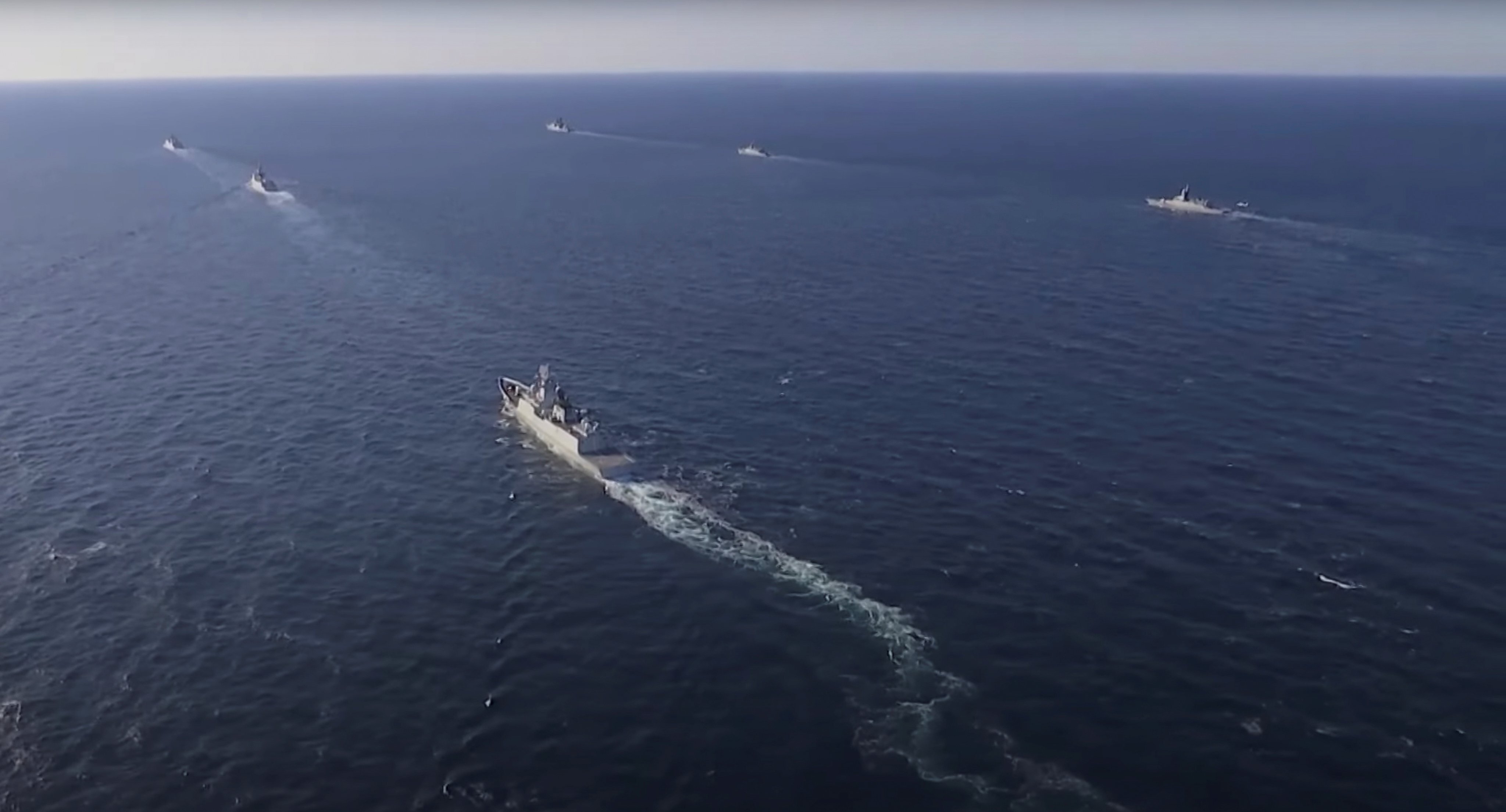 Naval vessels from China and Russia sail during a joint military drill in the Sea of Japan, in this video still released on October 18. Photo: Russian Defence Ministry/Reuters
