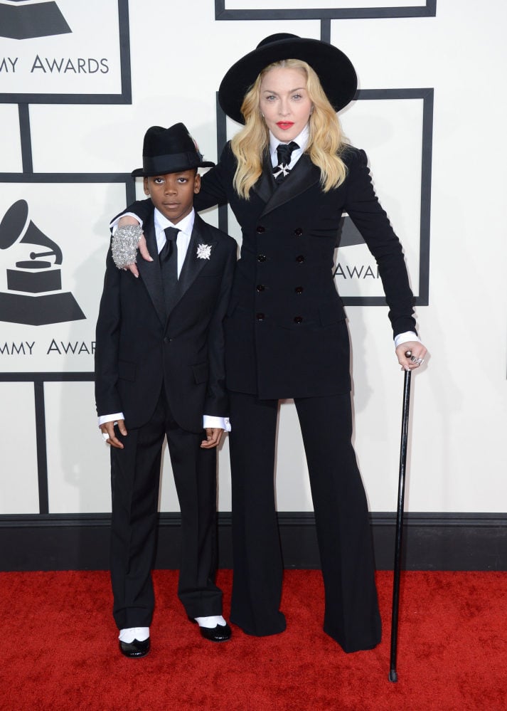 Madonna arrives with her son David at the 56th annual Grammy Awards at Staples Center, in January 2014, in Los Angeles. Photo: Invision/AP