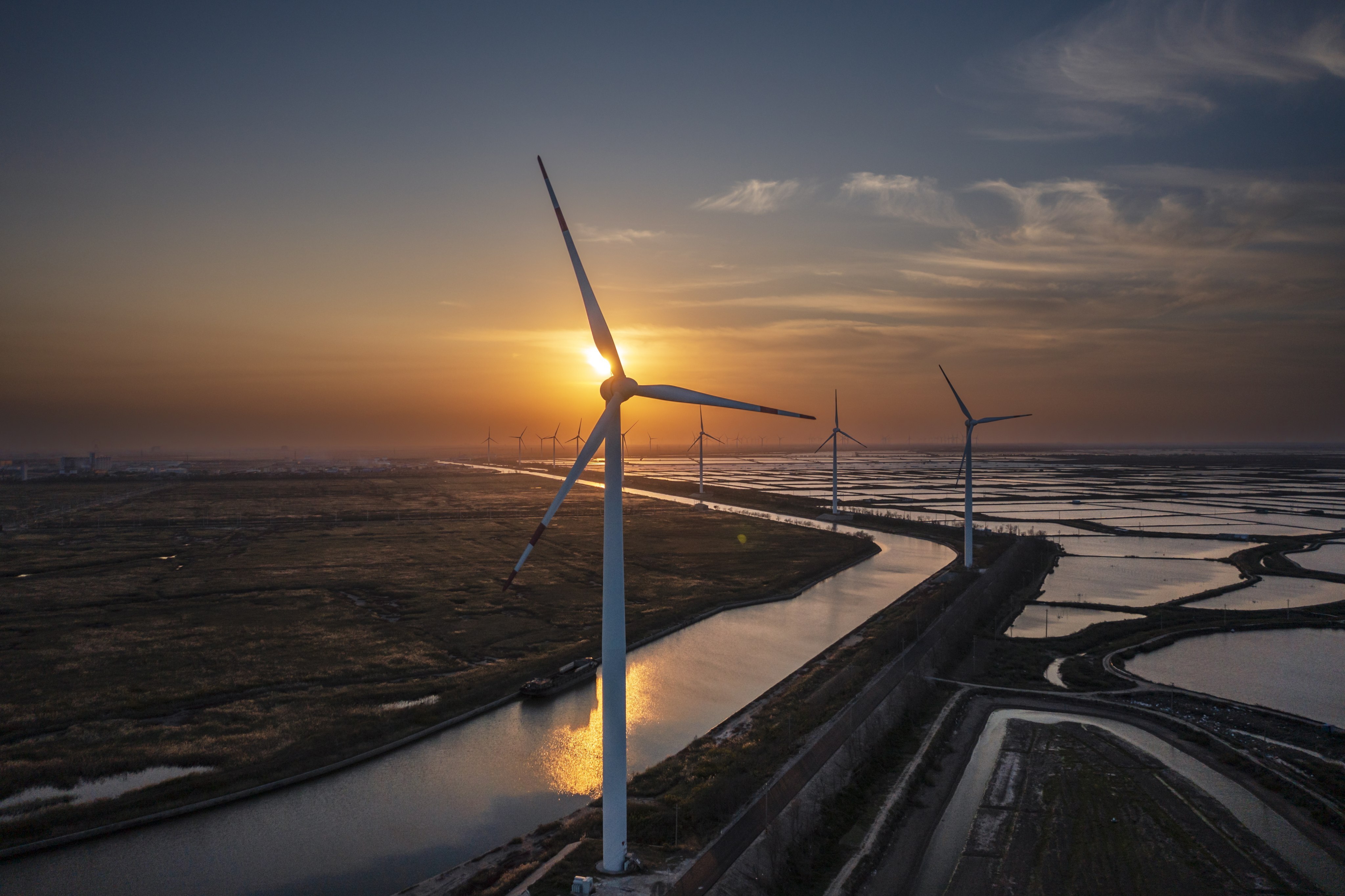 An aerial view of wind power generators in Yancheng, Jiangsu province, on October 27. China is at the centre of worldwide demand and supply for renewables. Photo: EPA-EFE 