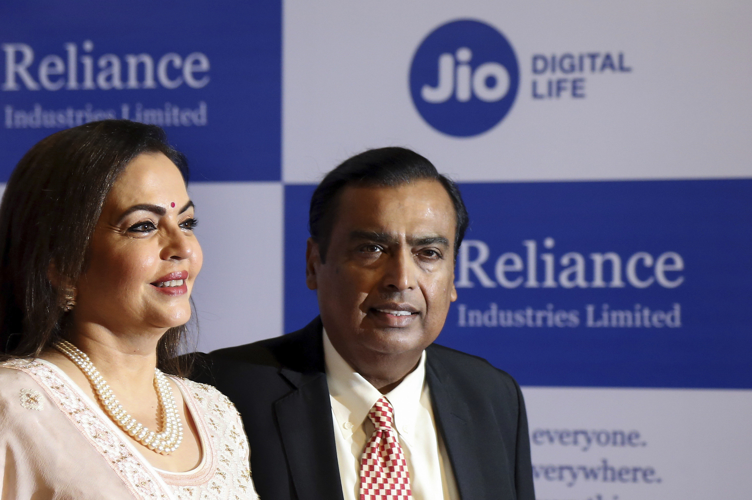 Chairman of Reliance Industries Limited Mukesh Ambani pictured with wife Neeta Ambani. File photo: AP