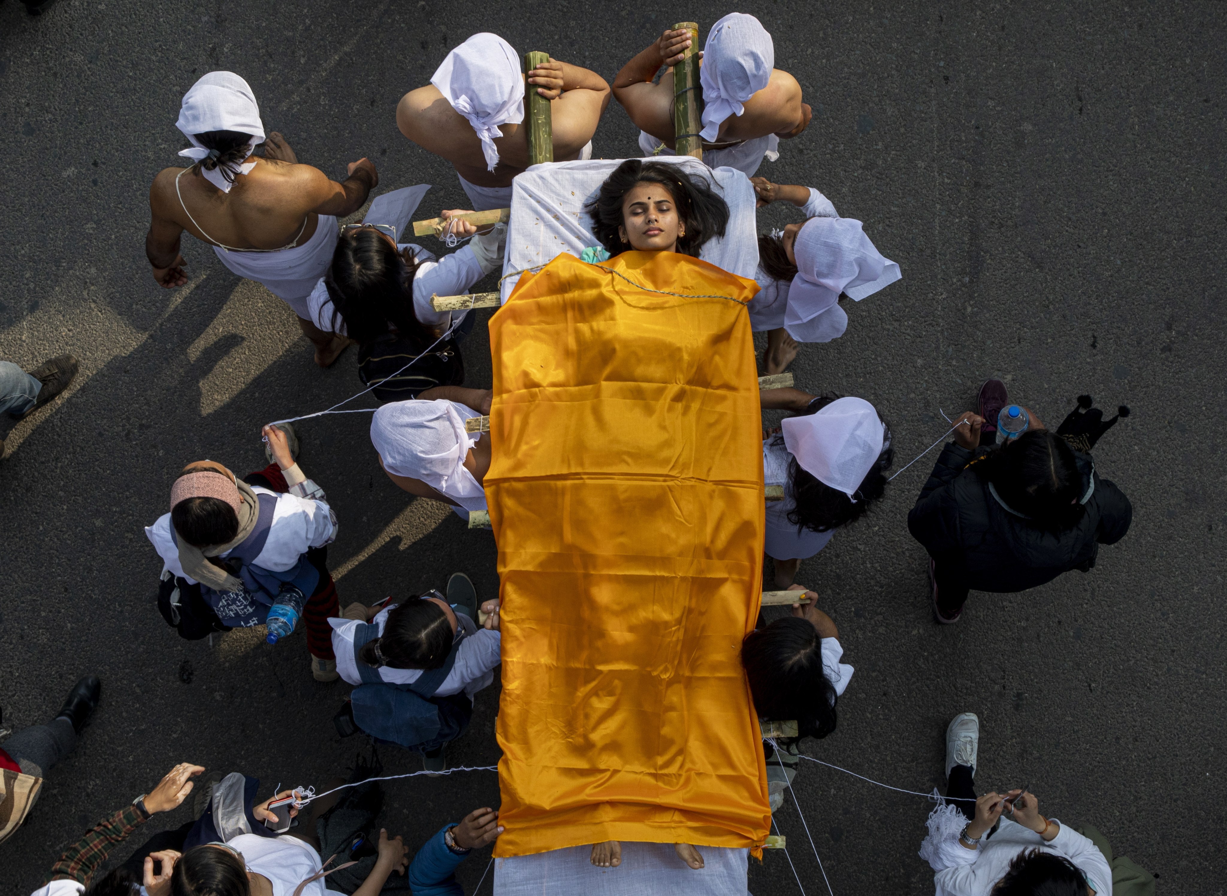 A mock funeral is staged in protest against rising cases of rape, murder and domestic violence against women in Kathmandu, Nepal, on February 12. Photo: EPA-EFE