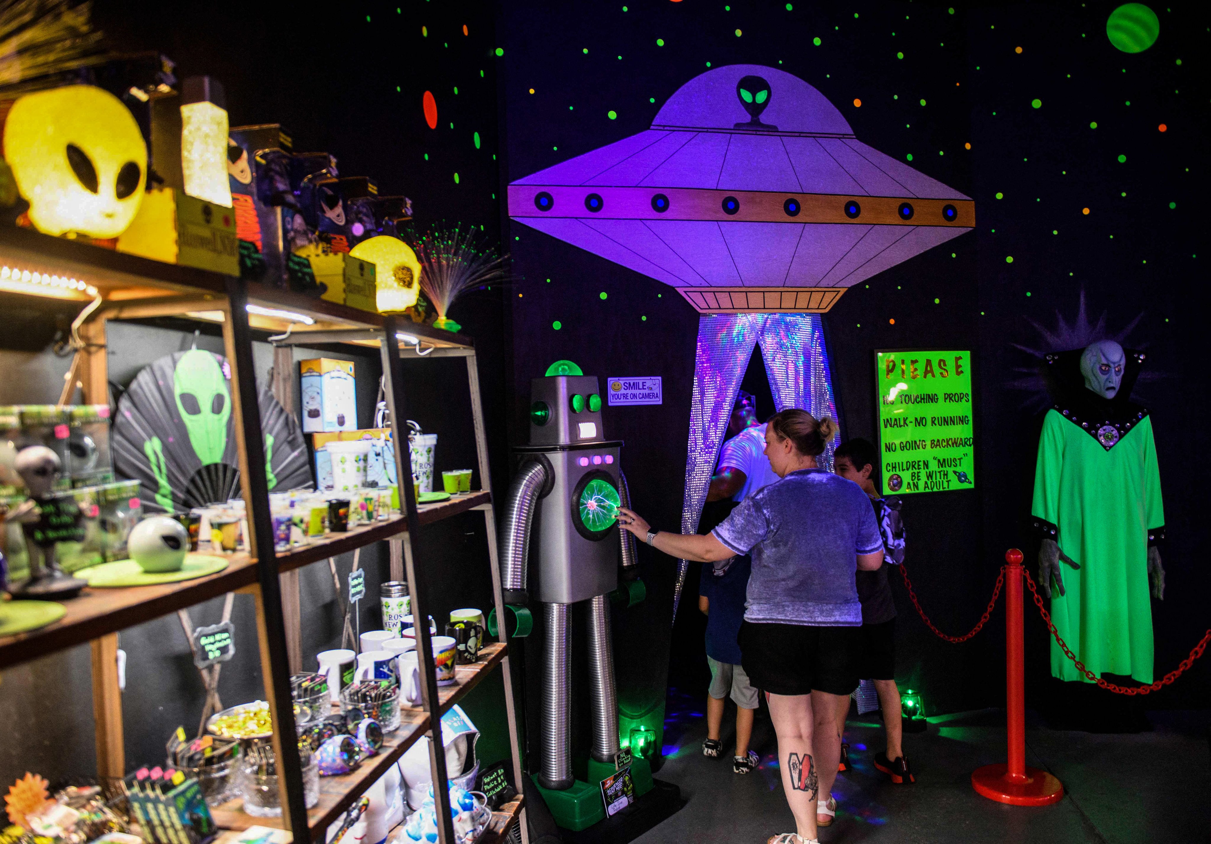 People enter the Roswell UFO Spacewalk attraction during the UFO Festival in New Mexico in July. Photo: AFP
