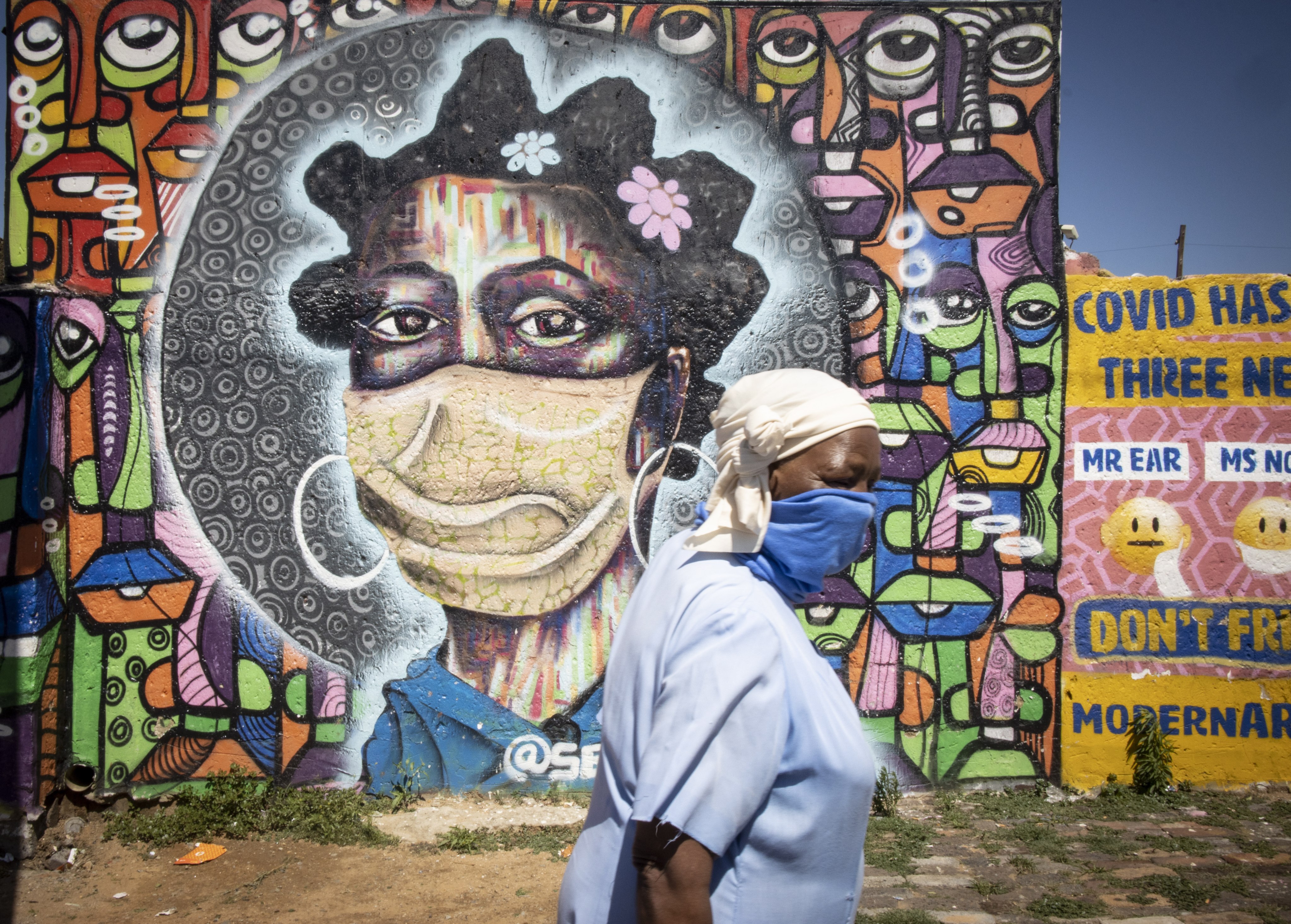 Graffiti art work in Johannesburg, South Africa, warns residents about the dangers of the coronavirus. Photo: EPA-EFE 