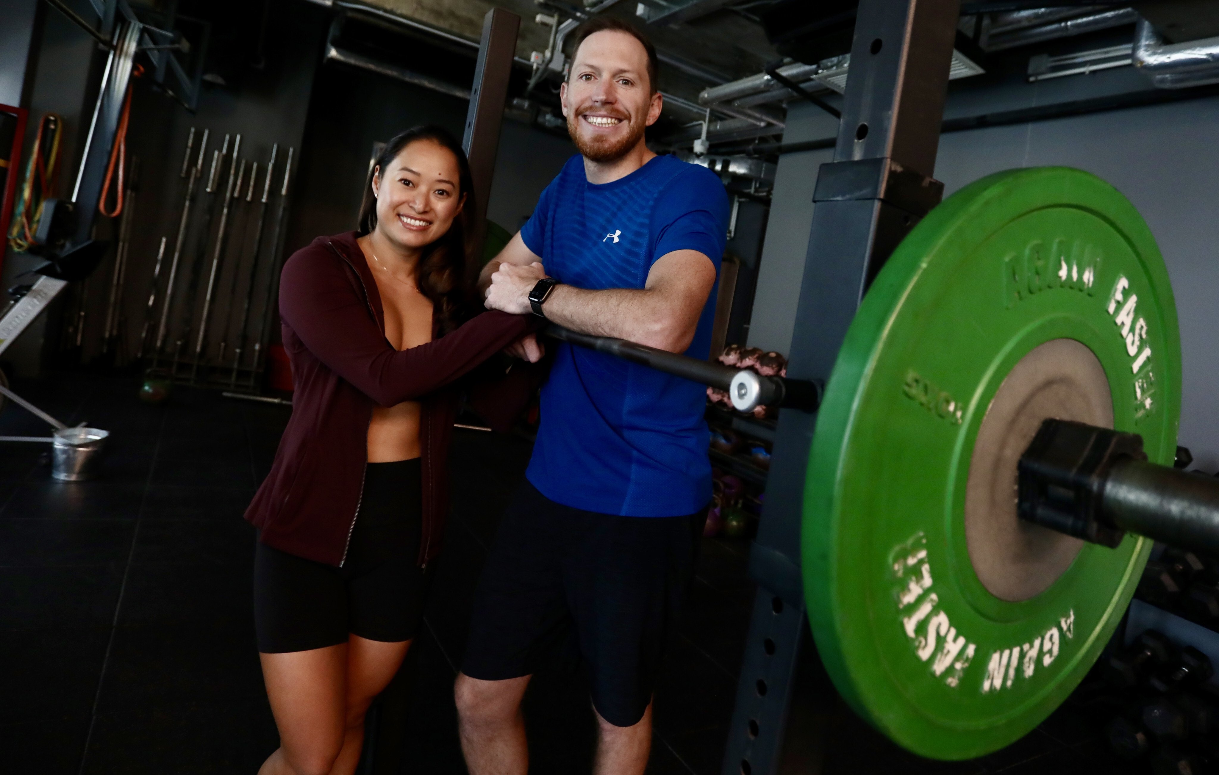 Nina Wong and John Houston initially met because of CrossFit and said fitness is a pillar of their relationship. Photo: Jonathan Wong