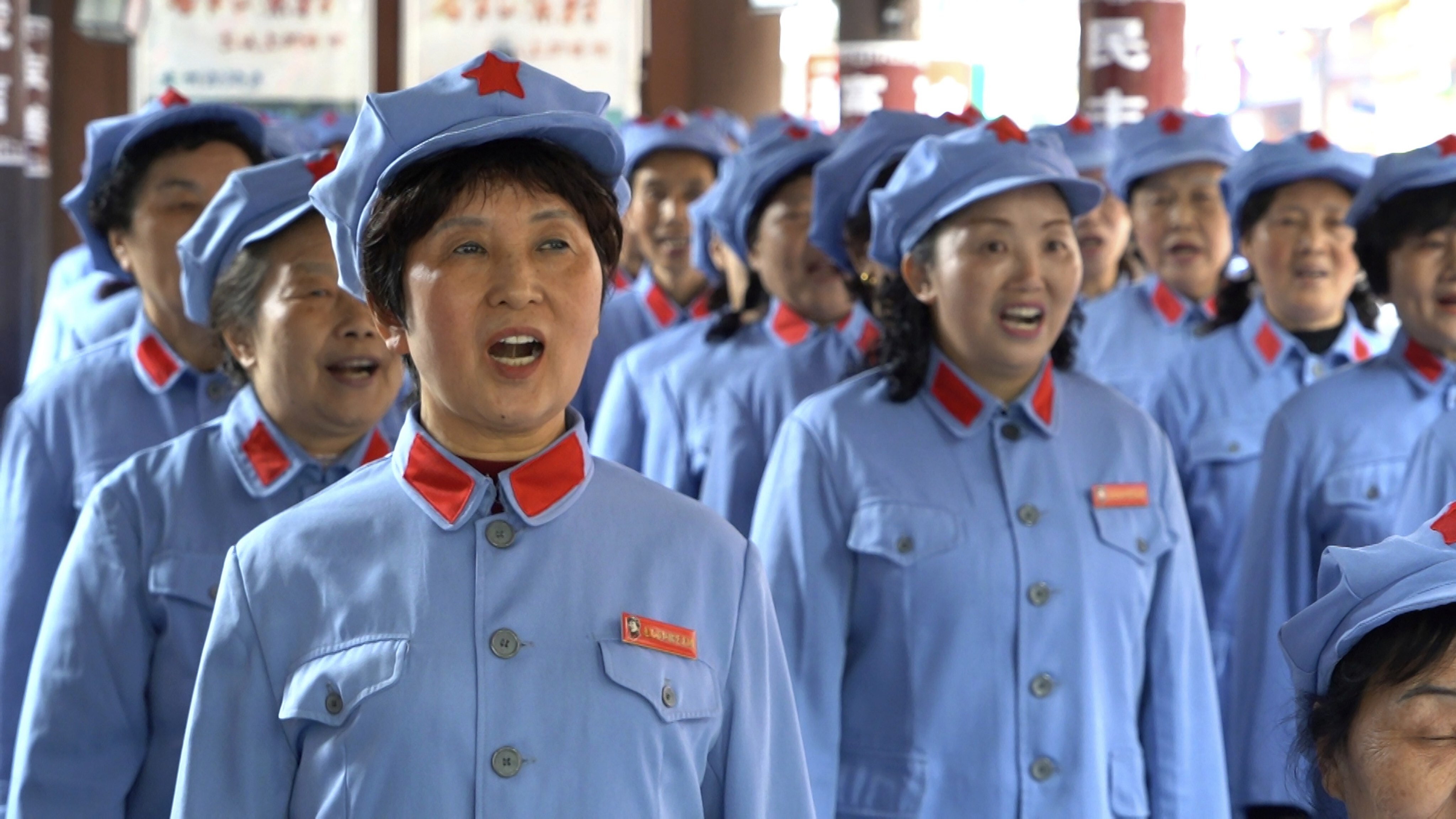 A group of local retirees gather to sing Red Army revolutionary songs in the city of Zunyi in Southwestern China’s Guizhou province. Photo: AP