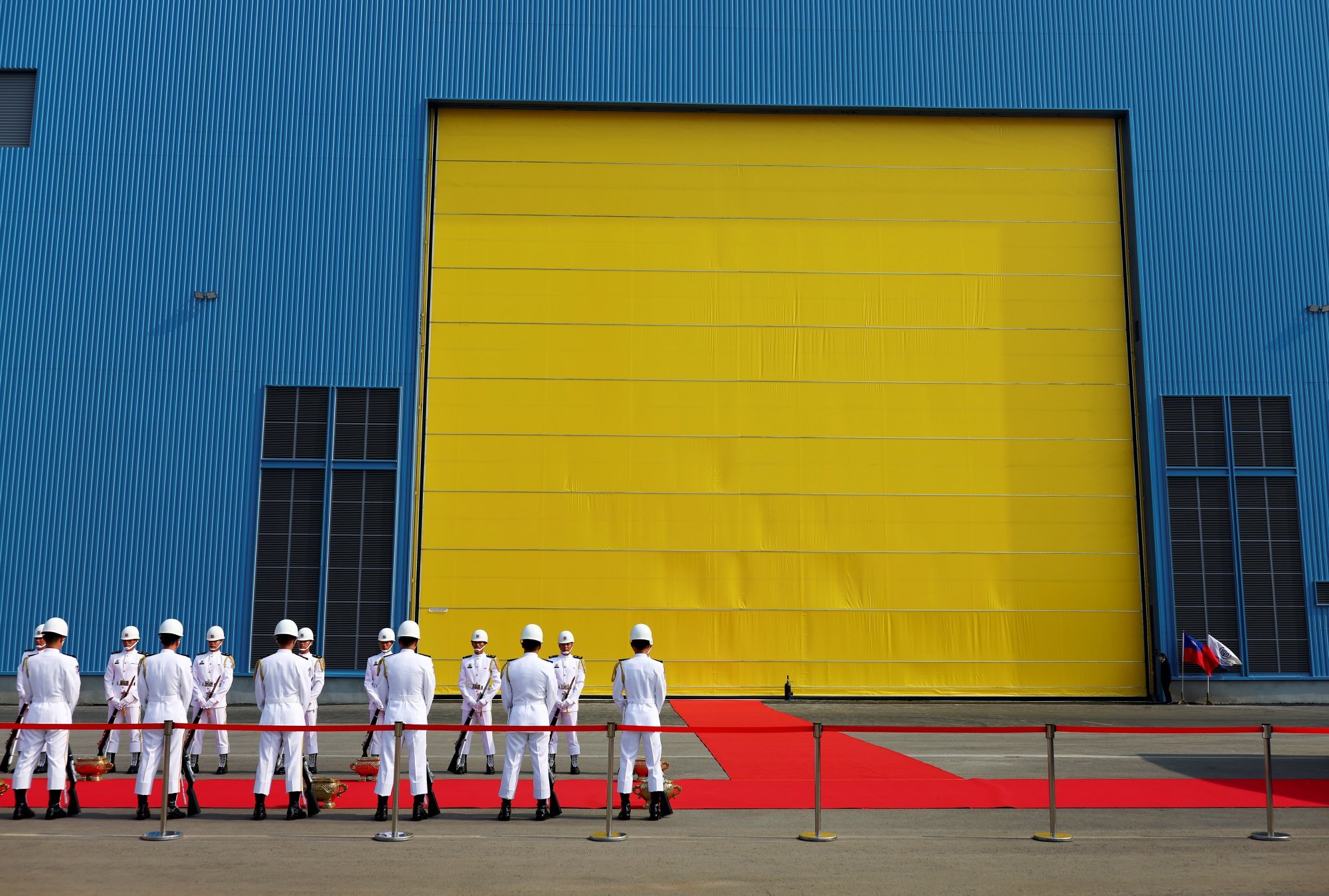 Honour guards stand outside the factory where the new submarine fleet is being built by CSBC Corporation in Kaohsiung. Photo: Reuters