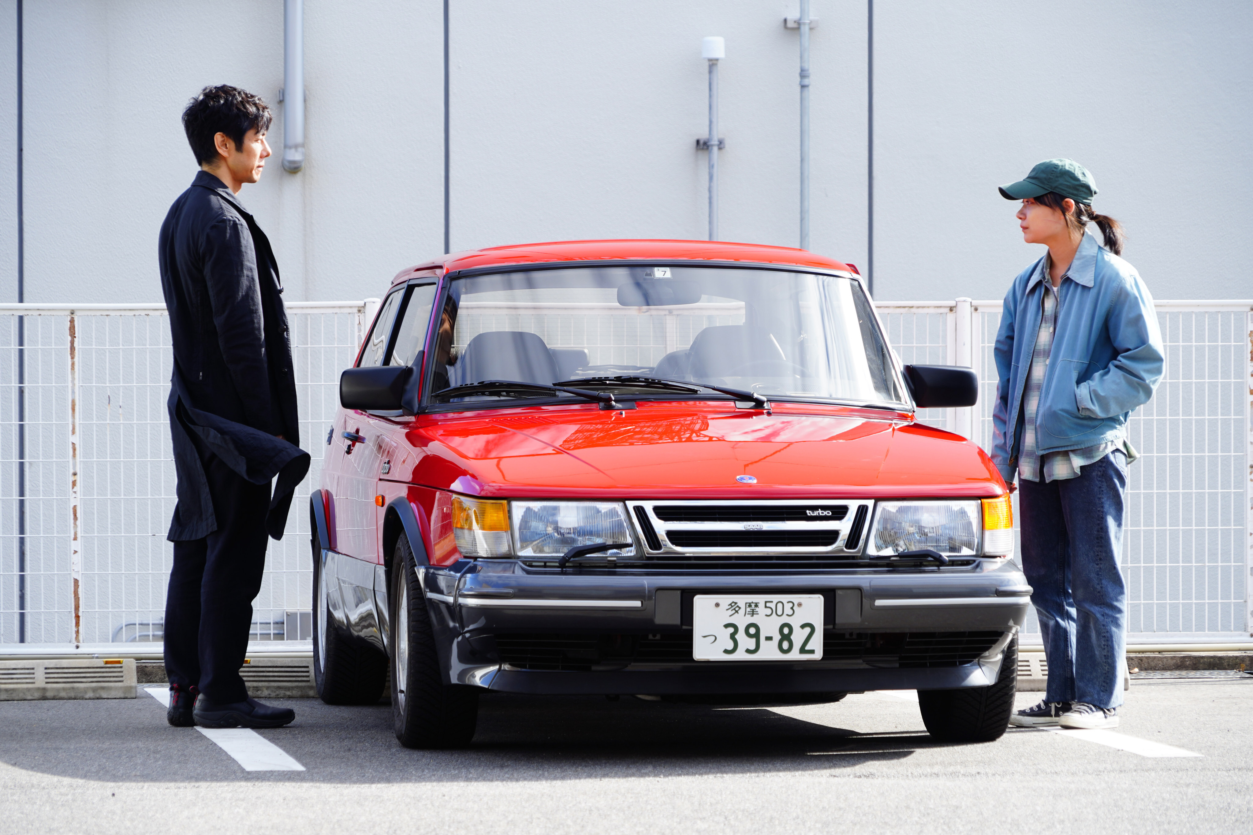 Hidetoshi Nishijima (left) and Toko Miura in a still from Drive My Car.