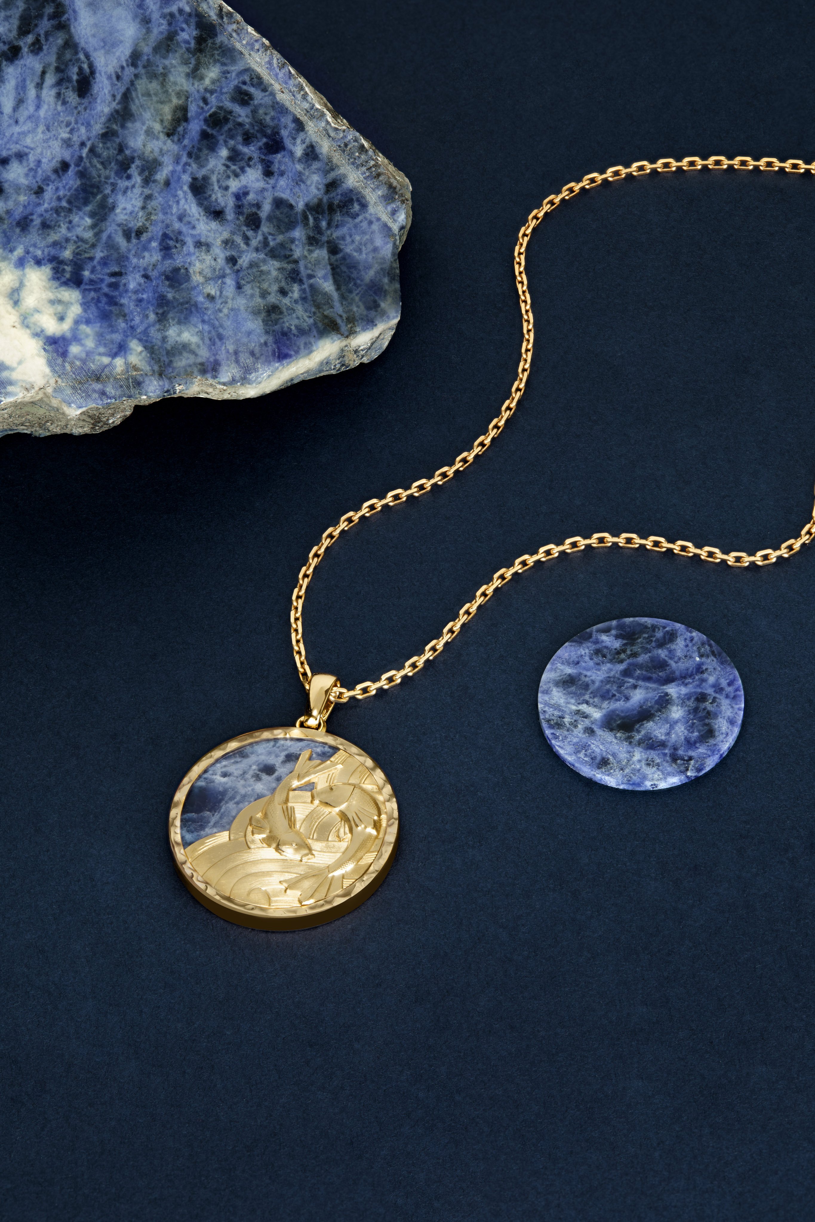 Van Cleef & Arpels Zodiaque Piscium necklace, with its sodalite background evoking the ocean depths. Photo: Van Cleef & Arpels