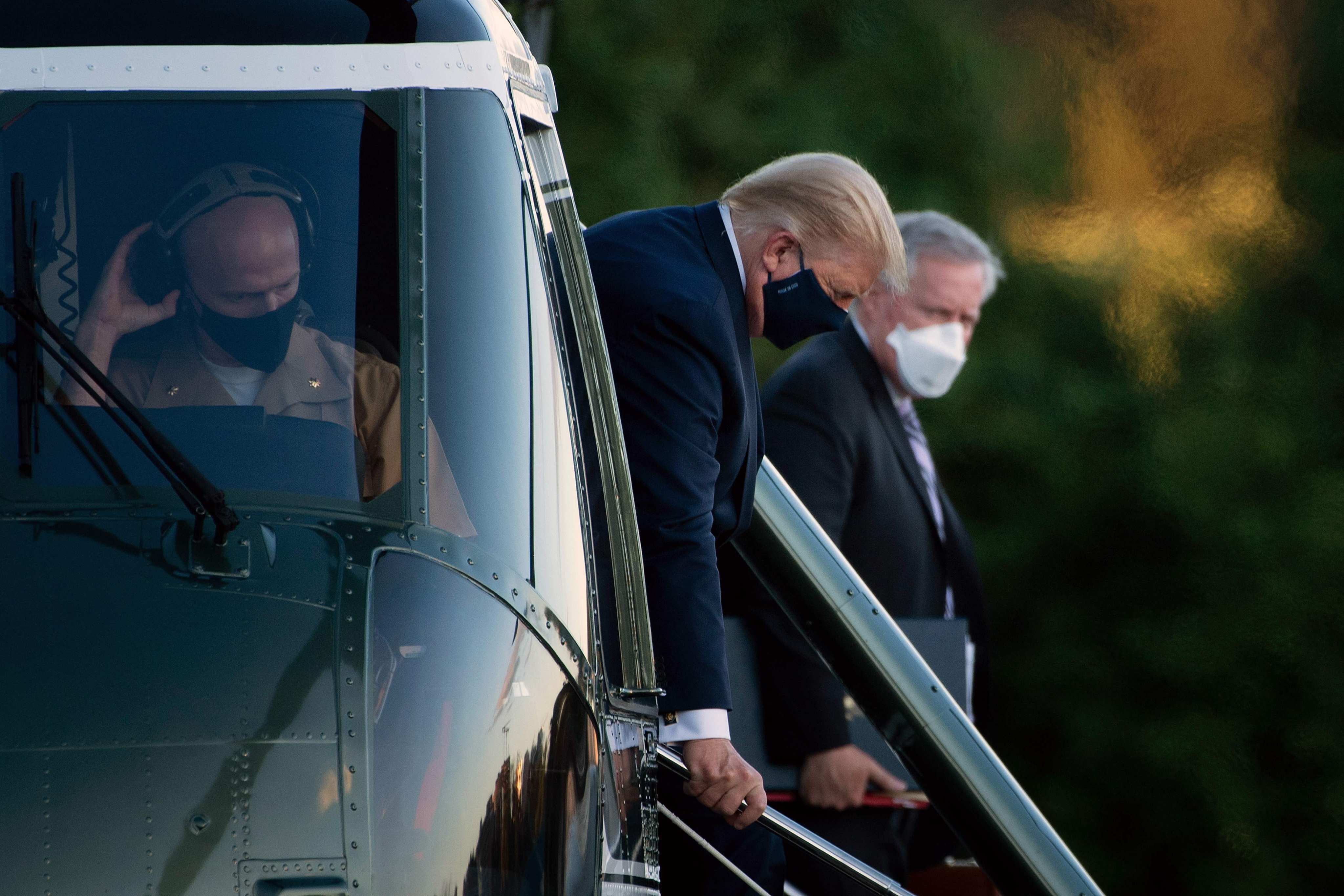 White House Chief of Staff Mark Meadows watches as then US president Donald Trump walks off Marine One at Walter Reed Medical Centre, after testing positive for Covid-19. File photo: AFP
