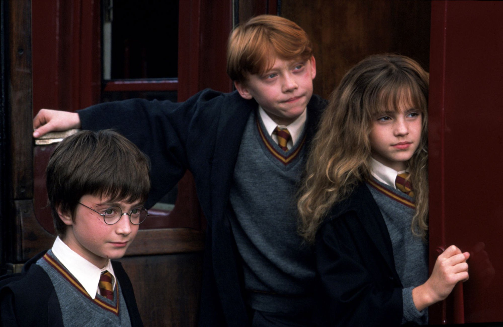 Daniel Radcliffe, Rupert Grint and Emma Watson in Harry Potter and the Philosopher’s Stone. Photo: Warner Bros. Pictures