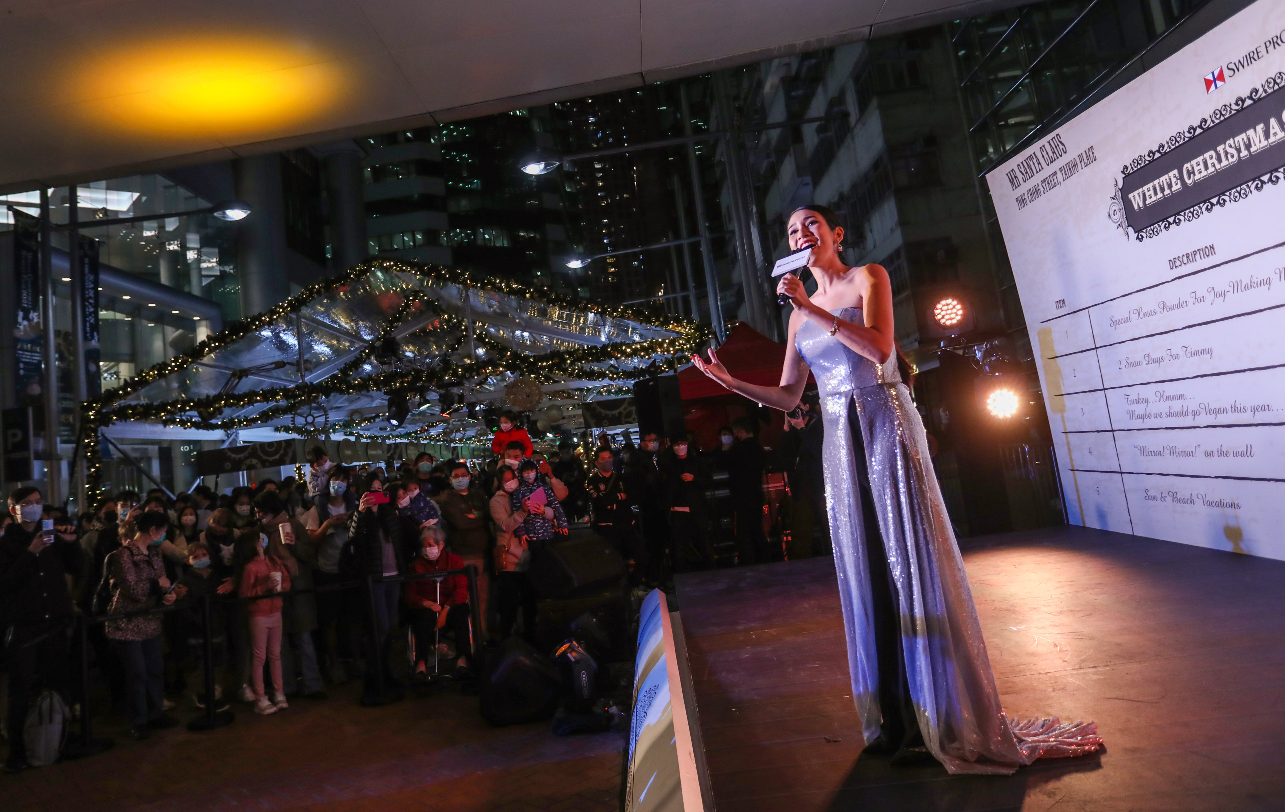 Singer Crisel Consunji performs at the opening of the White Christmas Street Fair in Quarry Bay on December 2. Photo: Jonathan Wong