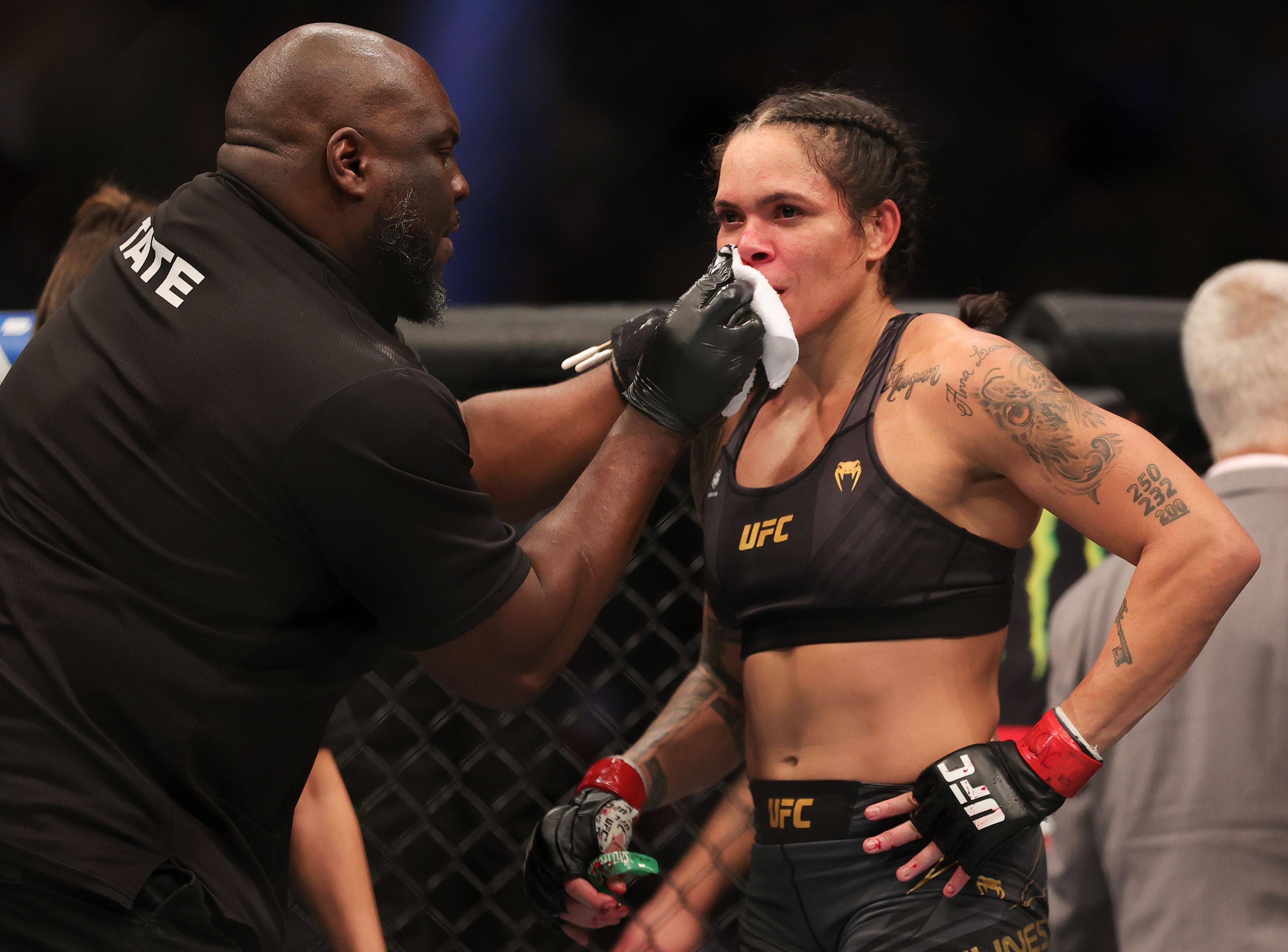 Amanda Nunes is tended to following her loss to Julianna Pena at UFC 269. Photo: AFP