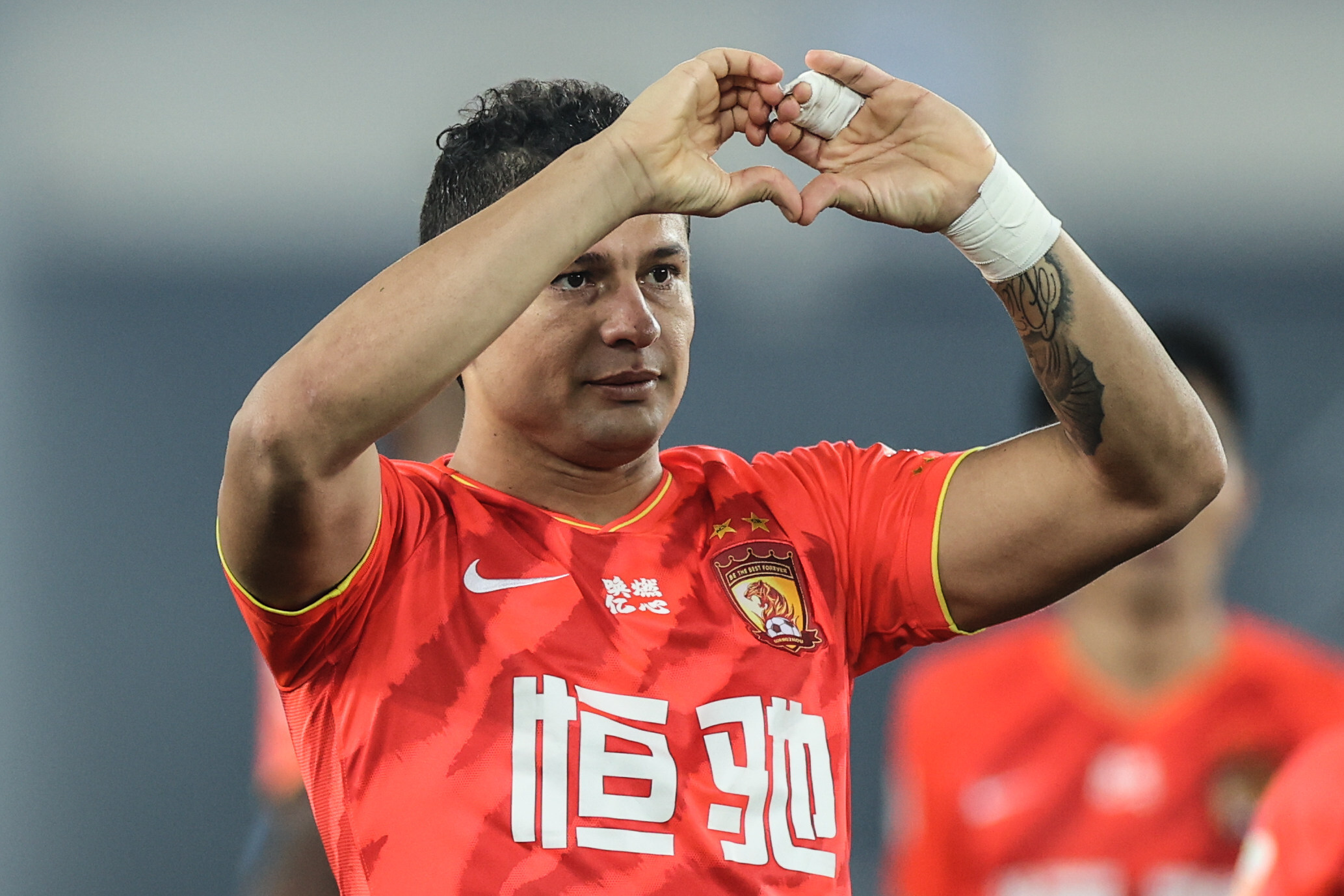 Elkeson celebrates during the 14th round match between Guangzhou Evergrande and Dalian Pro at the 2020 Chinese Football Association Super League. Photo: Xinhua